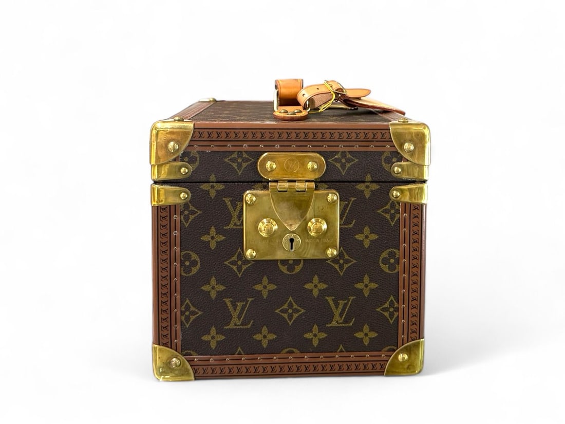 Louis Vuitton Boite Flacons Monogram - Majestic & Historic Vanity Trunk: The majestic Louis Vuitton Boite Flacons, a historic vanity trunk that embodies the legendary spirit of the Maison's savoir-faire. Crafted in iconic Monogram canvas with natural cowhide trim and opule