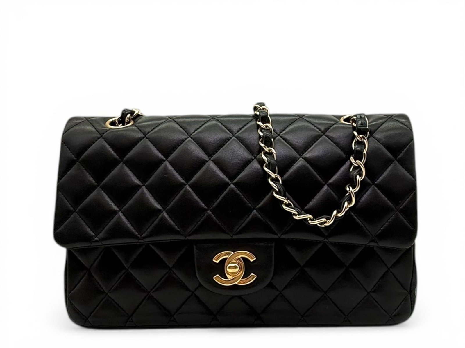 Chanel Timeless 11.12 Medium Bag, Black and Gold, Elegant Iconic Shoulder Bag: An elegant Chanel Timeless 11.12 Medium bag crafted in soft lambskin leather, embodying iconic design and refined sophistication. The classic black finish paired with gold hardware creates a timeless 