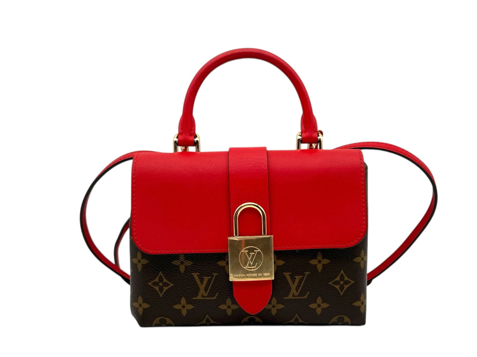 Louis Vuitton Locky BB Bold Monogram Red Striking Chic Bag: A captivating blend of iconic heritage and modern attitude, the Locky BB stands out with classic Monogram canvas and vibrant red leather accents. Compact yet impactful, it delivers refined elegance an