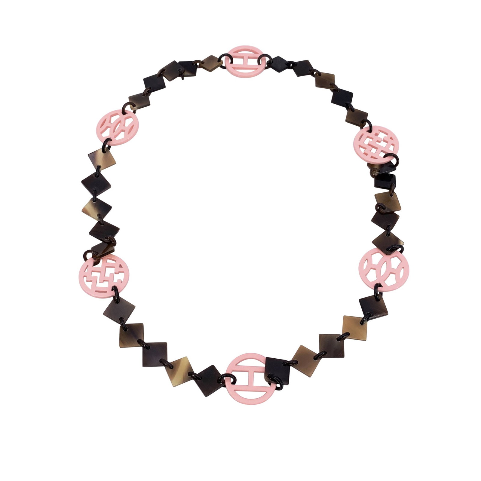 Hermes Horn Necklace: The iconic Hermes Buffalo Horn Lena Necklace is a timeless piece that perfectly embodies the house's elegant craftsmanship and playful sophistication. A must-have for the devoted Hermes collector or a