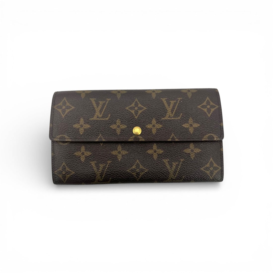 Louis Vuitton Vintage Cloth Wallet Sarah: Timeless and instantly recognizable, the Louis Vuitton 'Sarah' wallet is a refined essential for the discerning collector. Crafted in the brand's classic brown Monogram canvas, this piece pairs iconic