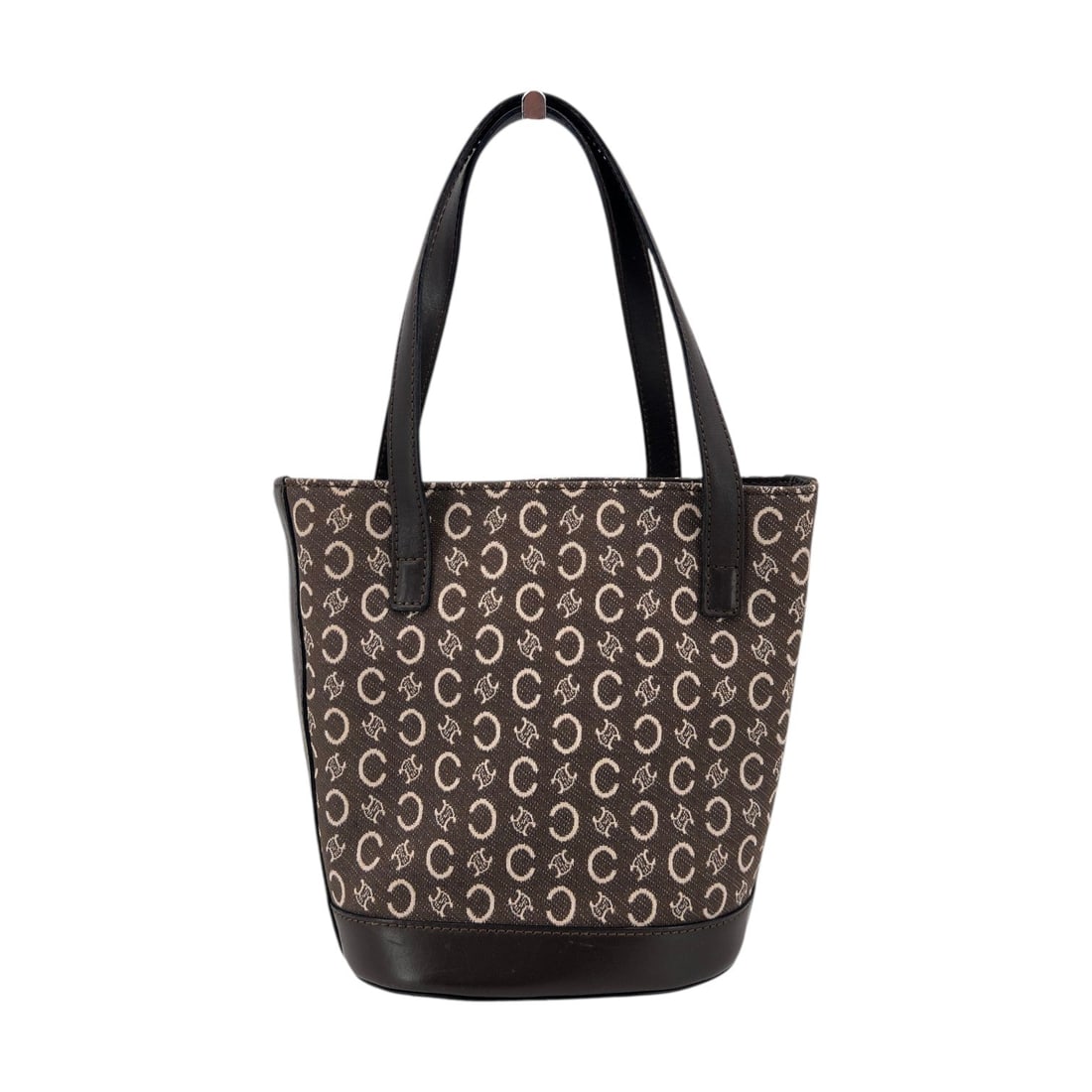 Celine Vintage Cloth Handbag C Macadam: Embrace the timeless allure of 1990s Italian craftsmanship with this Celine Vintage C Macadam Canvas Small Bucket Tote Bag. This exquisite piece showcases the iconic C Macadam pattern, a hallmark of C