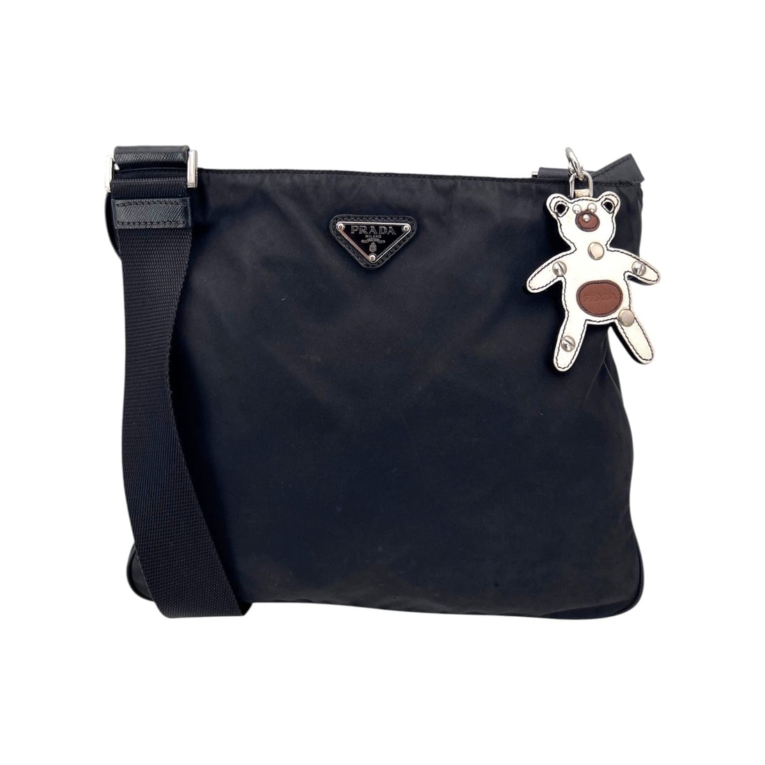 Prada Nylon Crossbody Bag Tessuto: Discover the perfect blend of modern utility and iconic 1990s heritage with this Prada Re-Nylon Tessuto Messenger Bag. A true testament to PRADA's innovative spirit, this medium-sized unisex accessory