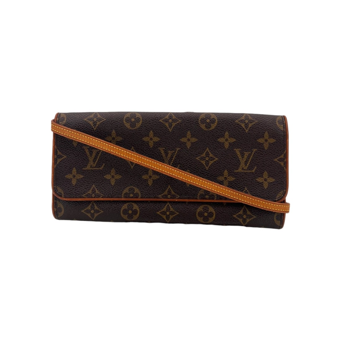 Louis Vuitton Cloth Crossbody Bag Twin: Embrace a piece of fashion history with the Louis Vuitton Twin, a quintessential accessory from the early 2000s that perfectly captures the era's effortless chic. This small crossbody bag, meticulousl
