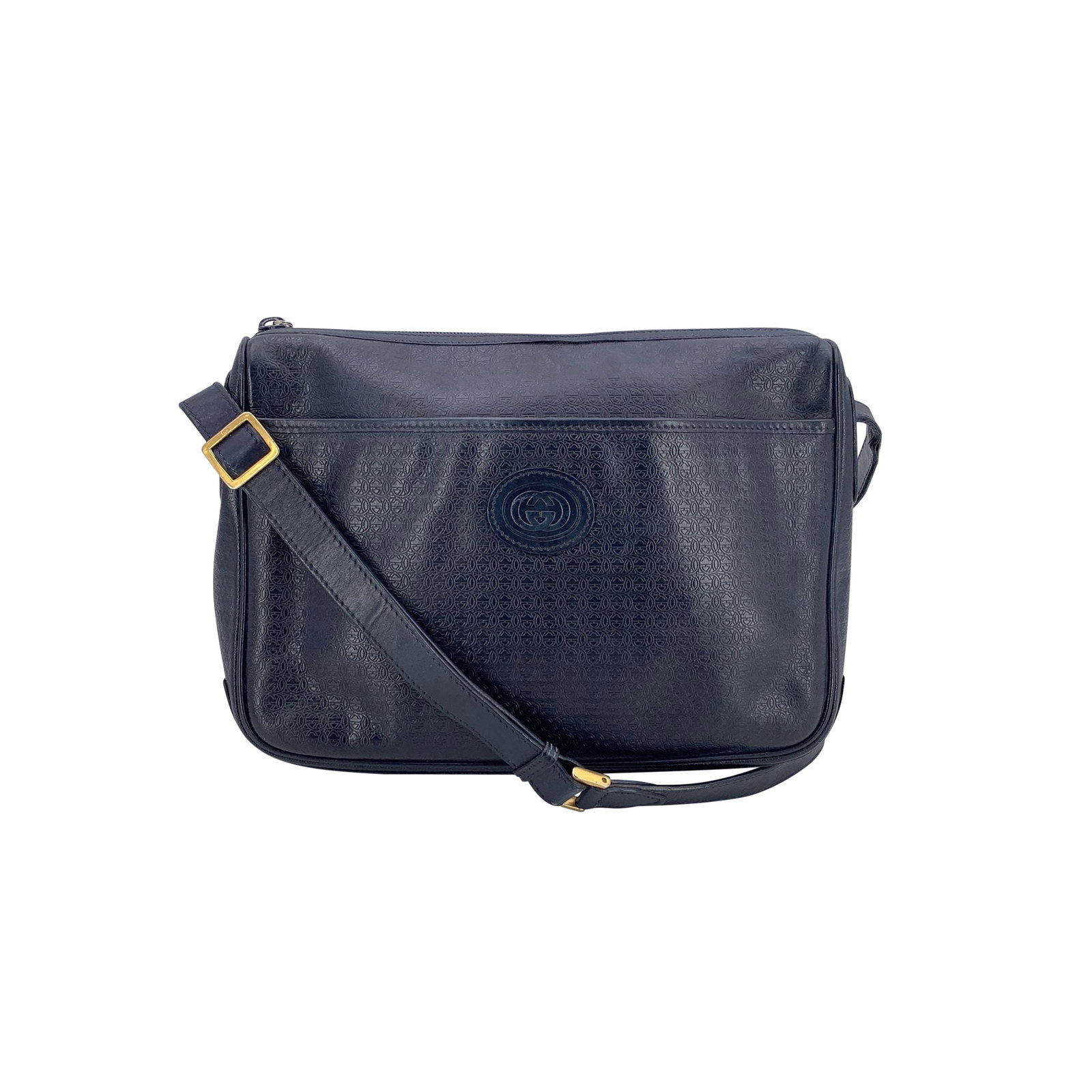 Gucci Vintage Leather Crossbody Bag: Step into a world of classic luxury with this beautiful vintage Gucci crossbody bag, an iconic piece from the renowned brand's accessory collection. Made from navy blue embossed leather with GG monogr