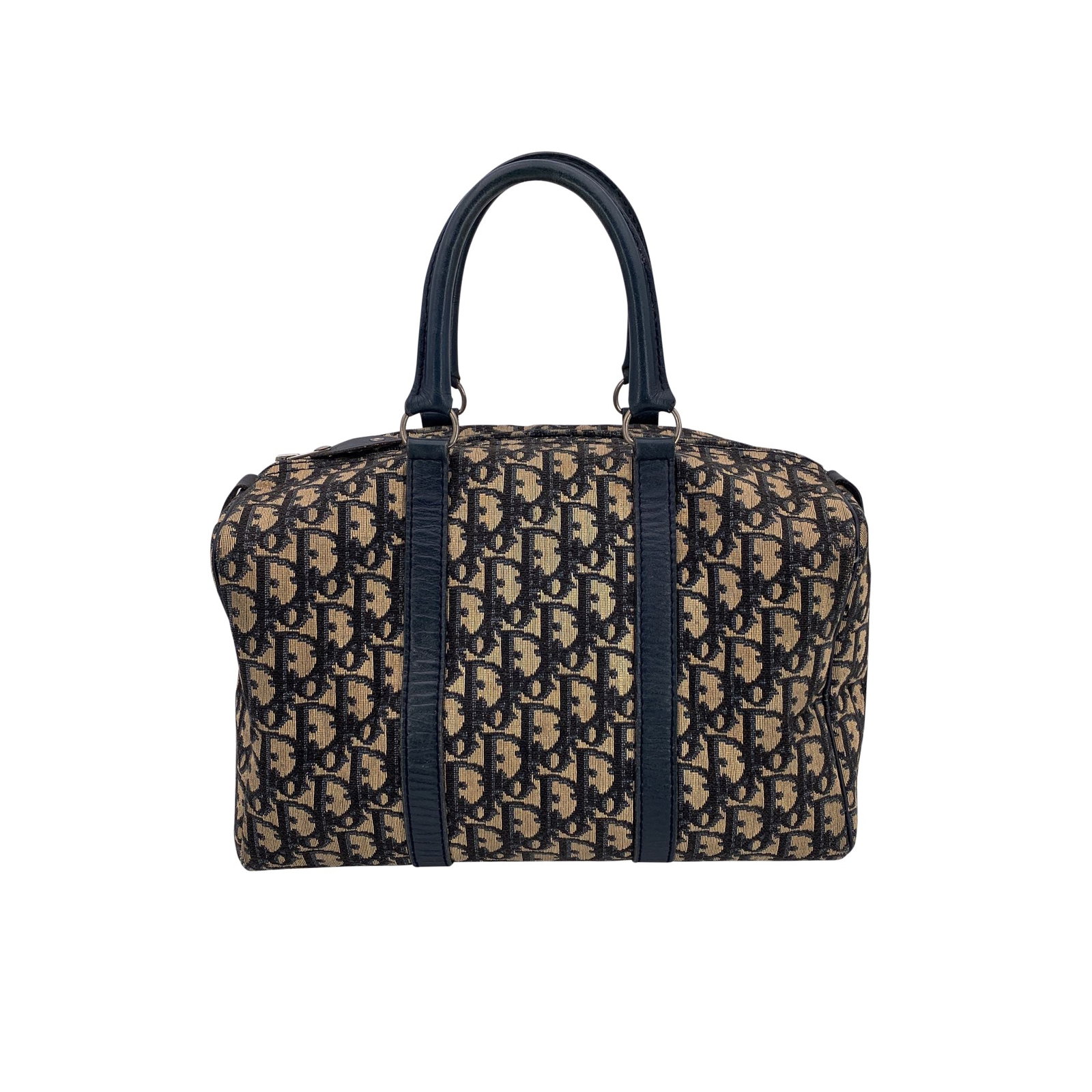 Dior Vintage Cloth Handbag Diorissimo: Step back into timeless Parisian elegance with this vintage Christian Dior Boston Bag, a classic silhouette reimagined in the house's signature blue 'Diorissimo' monogram canvas. Trimmed in genuine