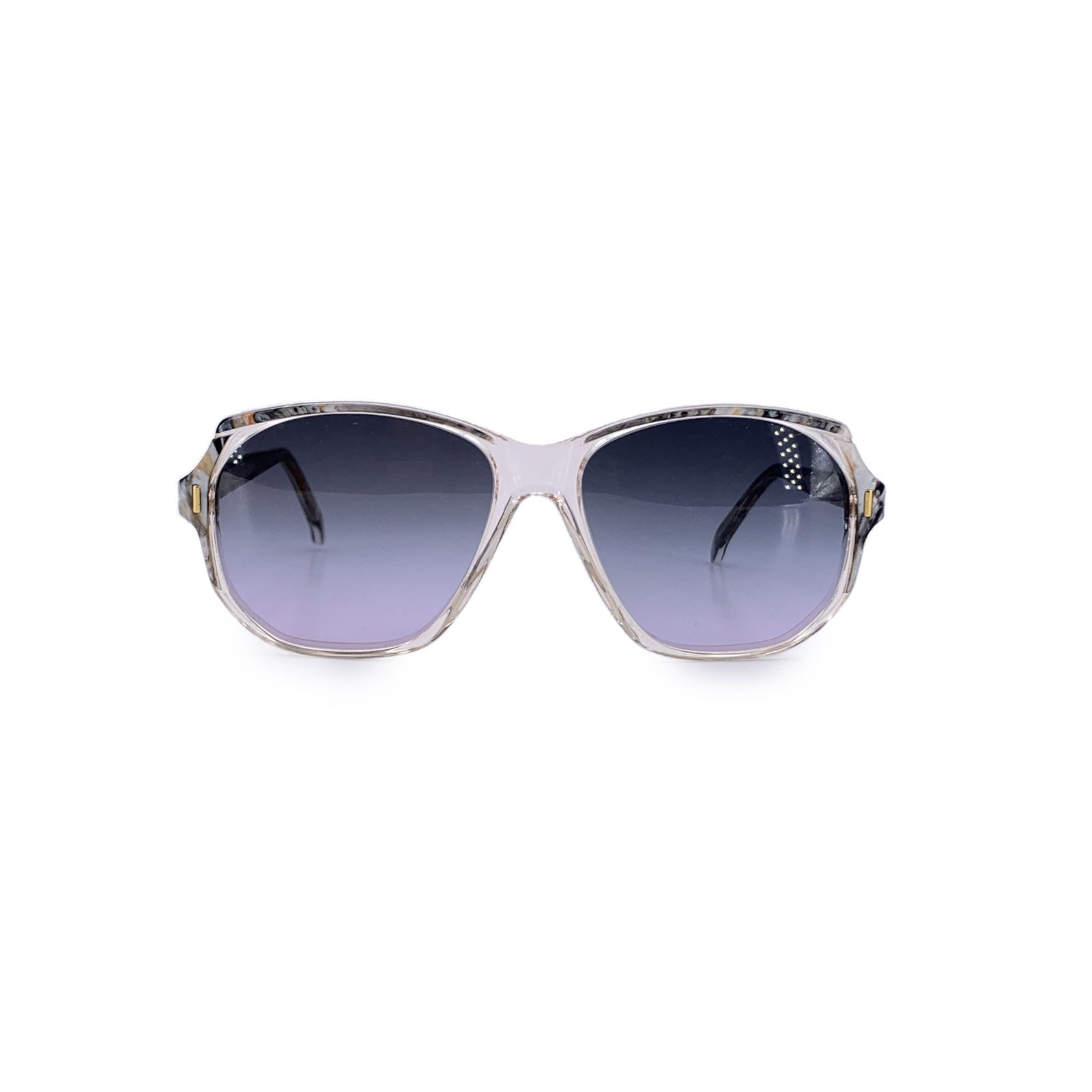 Yves Saint Laurent Vintage Plastic Sunglasses: A refined echo from the haute couture runways of the 1980s, these Yves Saint Laurent Vintage SALAMINE Sunglasses are a captivating expression of quiet luxury and sculptural design. Crafted in France