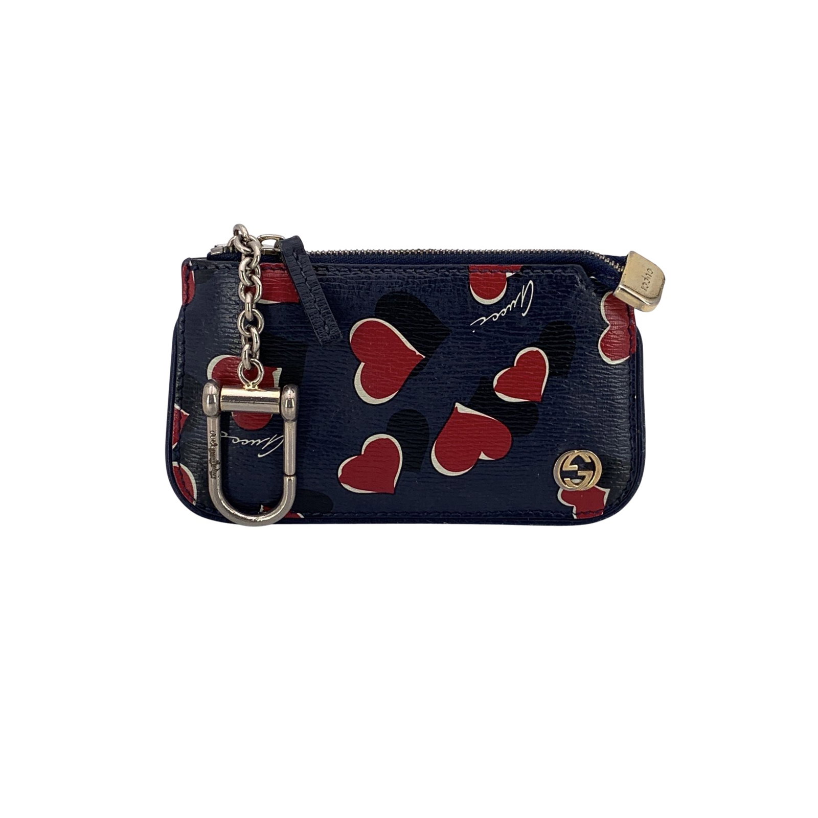 Gucci Leather Wallet: Gucci GG Heart Logo Key Pouch - Blue Leather Charming and practical, this Gucci key pouch is crafted in blue leather adorned with the classic heart print. The front is finished with a gold-tone GG