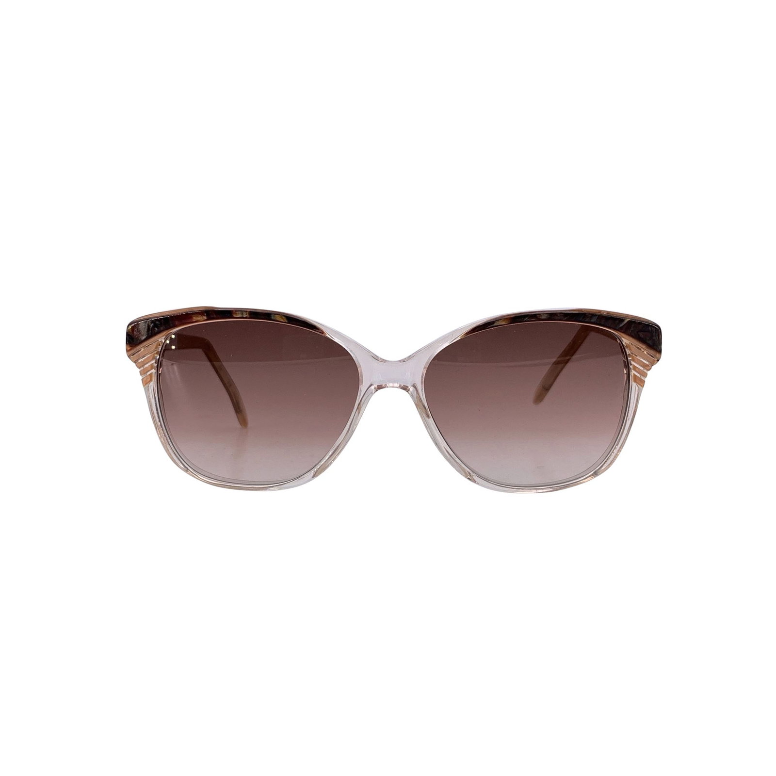 Yves Saint Laurent Vintage Plastic Sunglasses: These vintage Yves Saint Laurent SOPHOCLE sunglasses embody the quiet glamour of the 1980s-a decade when YSL elevated every accessory into a statement of effortless Parisian chic. Made in France, this