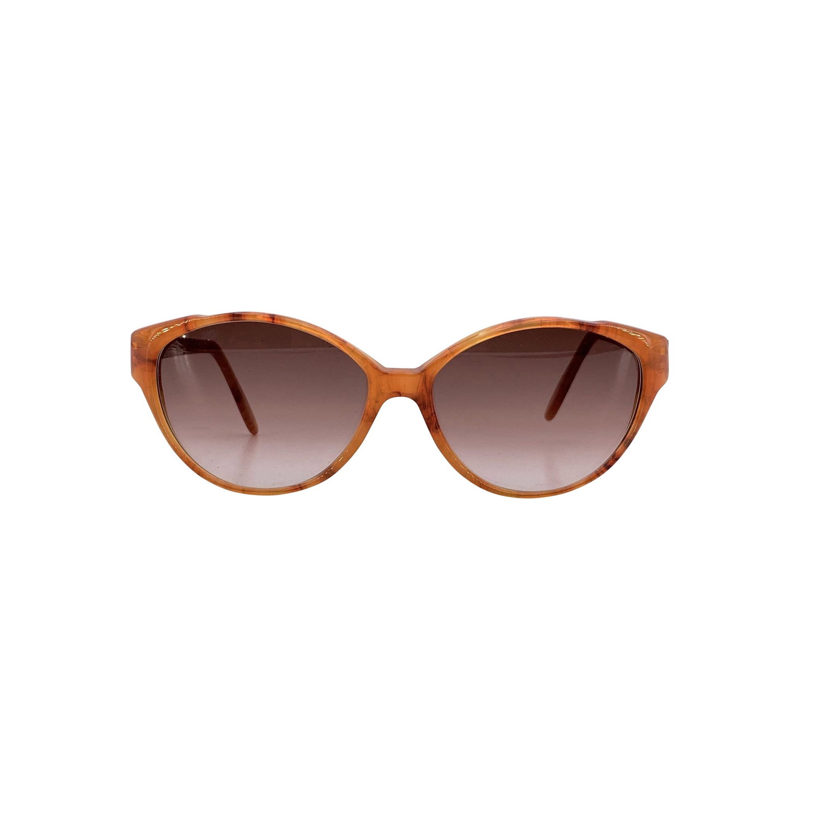 Yves Saint Laurent Vintage Plastic Sunglasses: Step into the bold elegance of the 1980s with these vintage TOHAS cat-eye sunglasses by Yves Saint Laurent. Crafted in France from vibrant orange plastic, the frame exudes a playful yet sophisticated 
