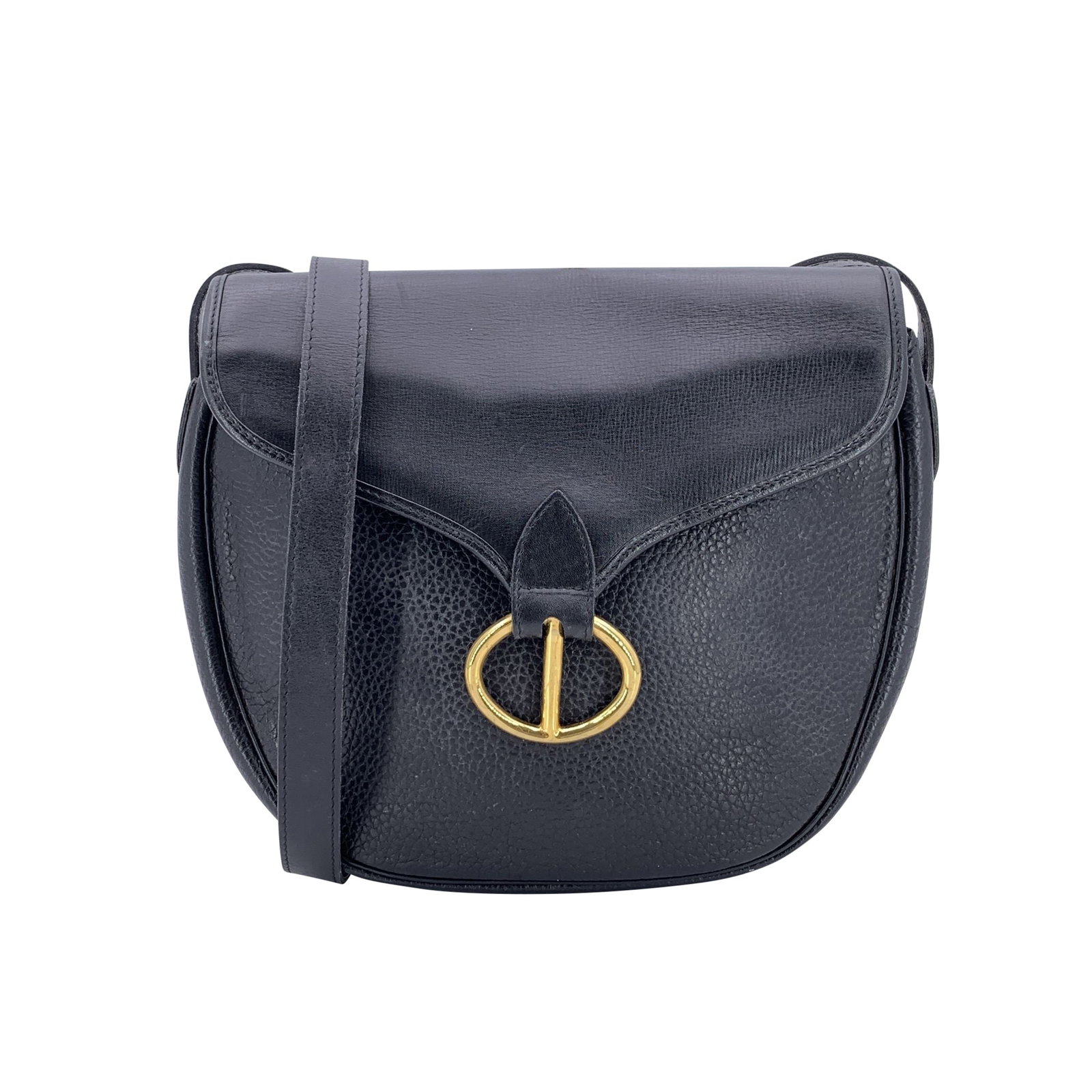 Dior Vintage Leather Crossbody Bag Bobby: Timeless elegance meets practical sophistication in this Christian Dior Vintage Black Leather Bobby Crossbody Bag. Crafted in France during the 1990s, the Bobby model is a quintessential example of Di