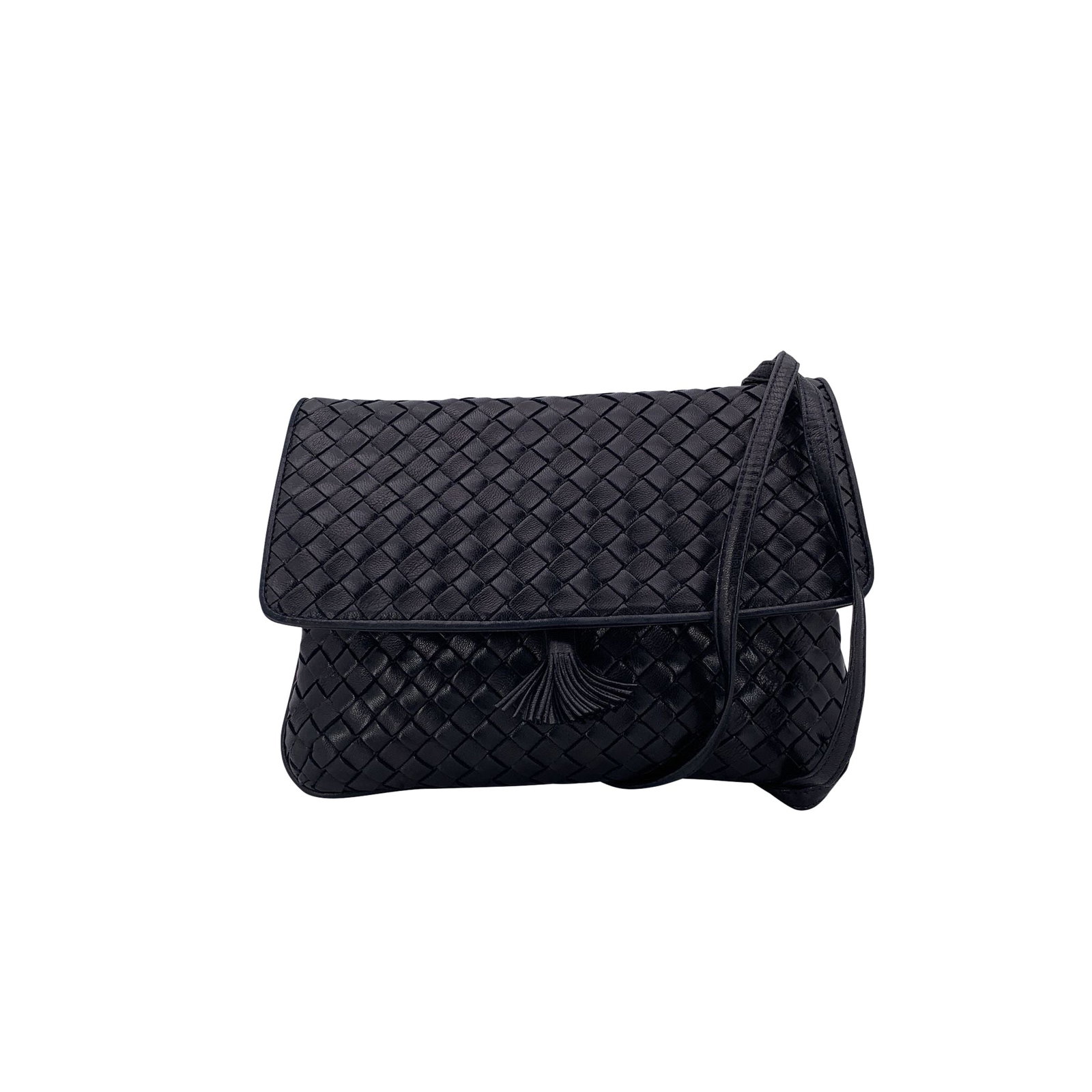 Bottega Veneta Vintage Leather Crossbody Bag: This Bottega Veneta Vintage Black Woven Intrecciato Tassel Crossbody Bag is small, elegant, and effortlessly timeless: it embodies the essence of the Intrecciato tradition. Handcrafted in Italy from s