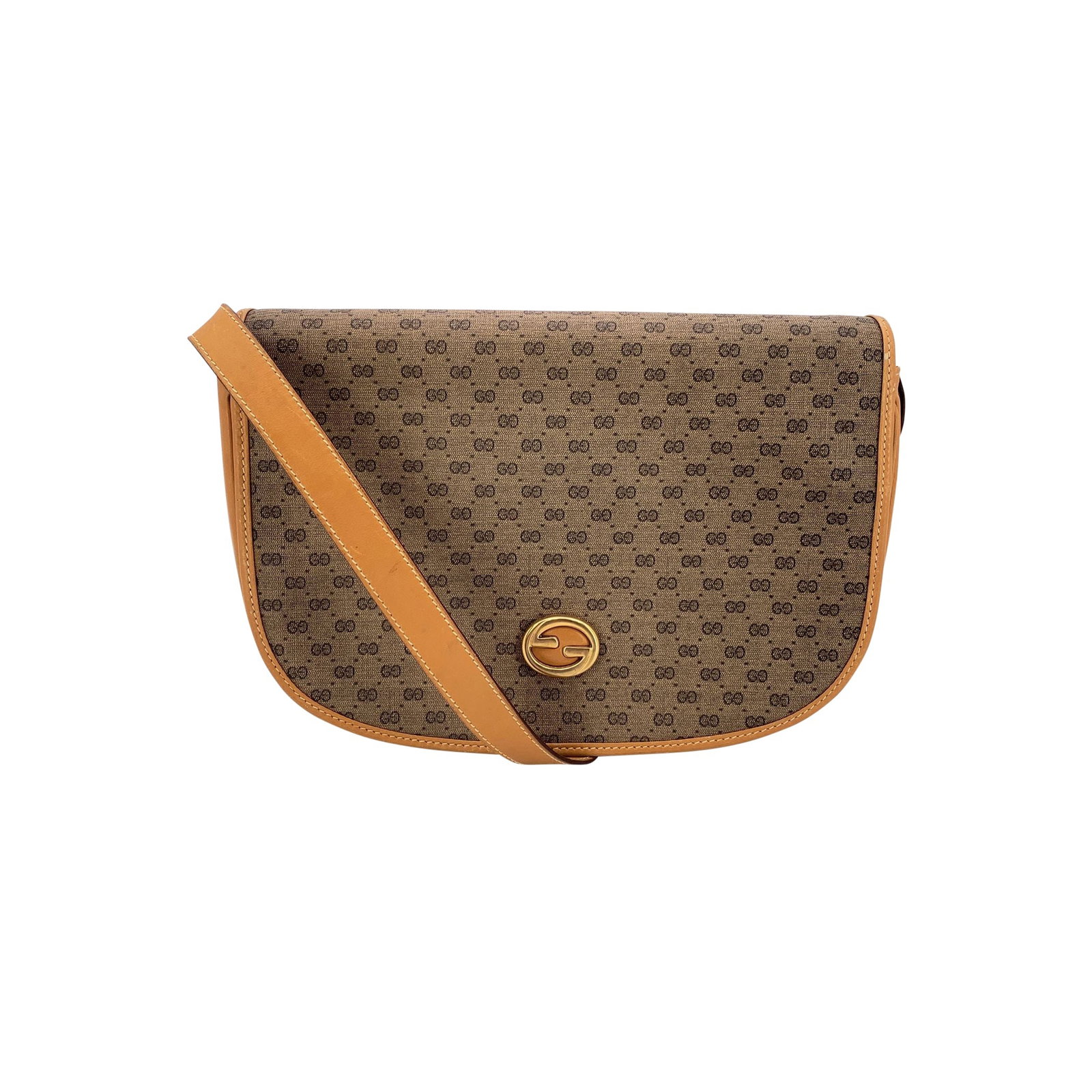 Gucci Vintage Cloth Shoulder Bag: A true relic of understated luxury, this Gucci Vintage Flap Shoulder Bag in classic beige monogram canvas is a love letter to the house's heritage. Crafted in beige GG monogram canvas and finished wit