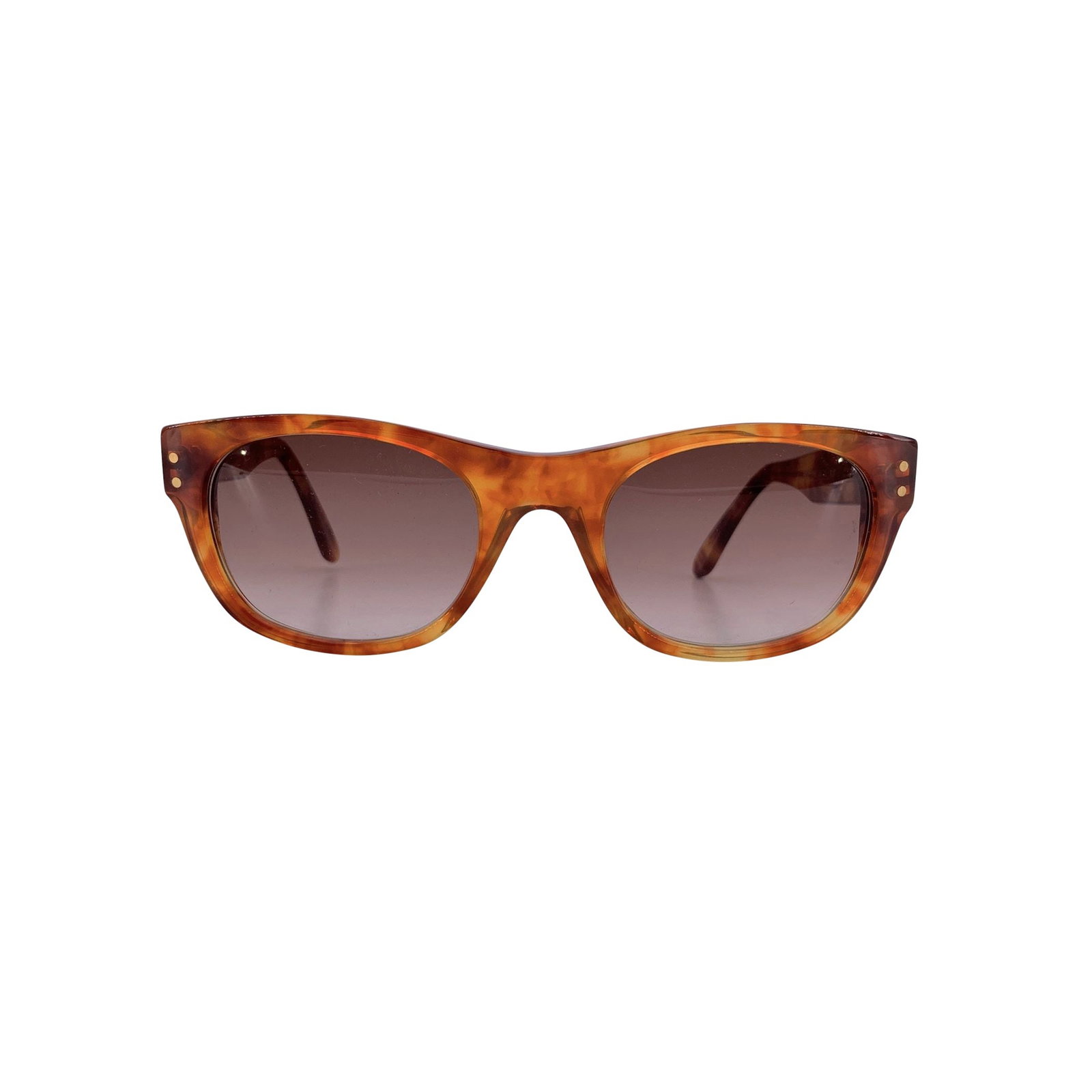 Yves Saint Laurent Vintage Plastic Sunglasses: Embodying the refined elegance of 1980s French couture, these Yves Saint Laurent Vintage Rectangle Sunglasses THEOPHANE showcase the Maison's talent for blending classic shapes with luxurious details.