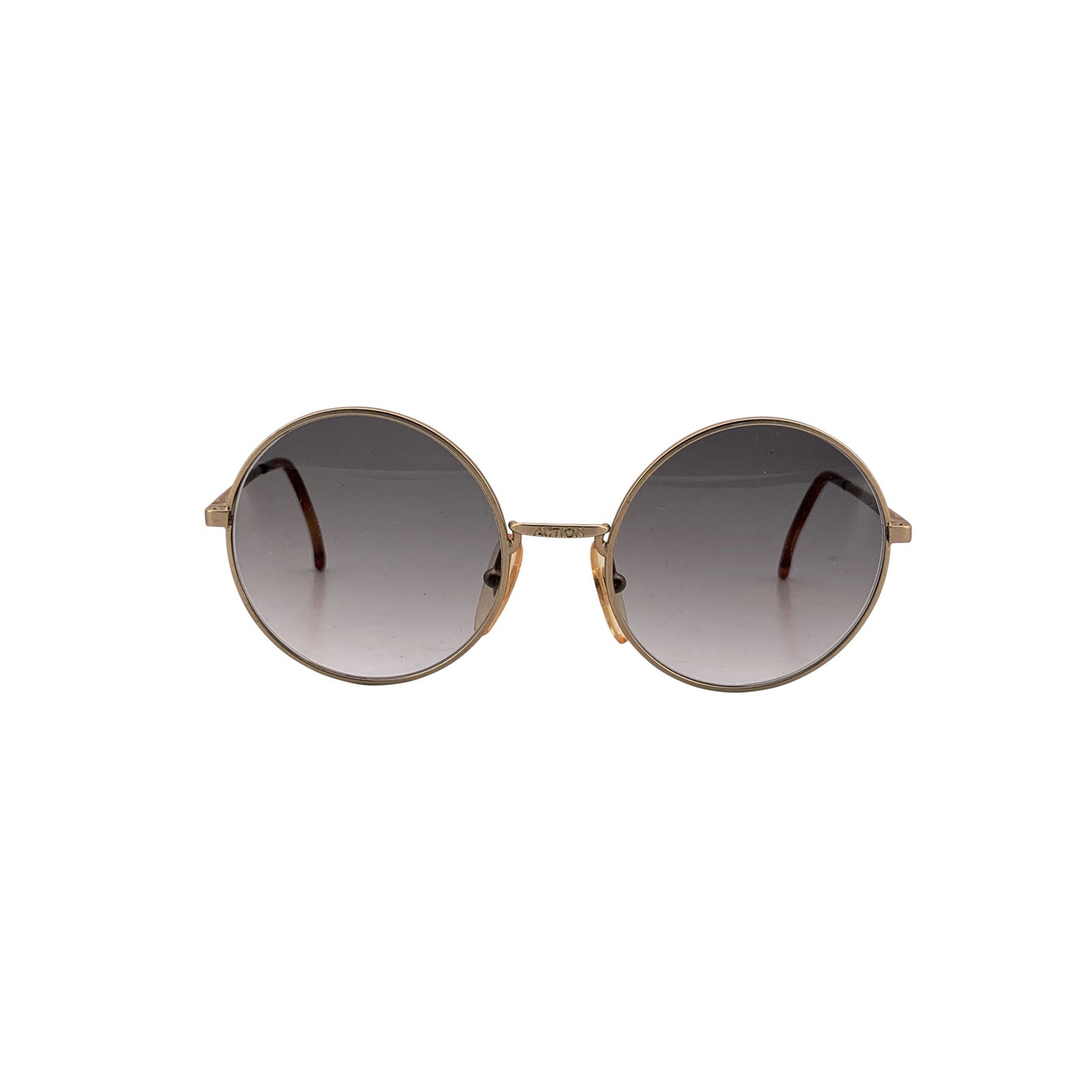 Trussardi Vintage Metal Sunglasses: These Trussardi Vintage Round Unisex Sunglasses Mod. 302 capture the quiet sophistication and impeccable craftsmanship that defined Italian style in the 1980s. Designed and made in Italy, this elegant