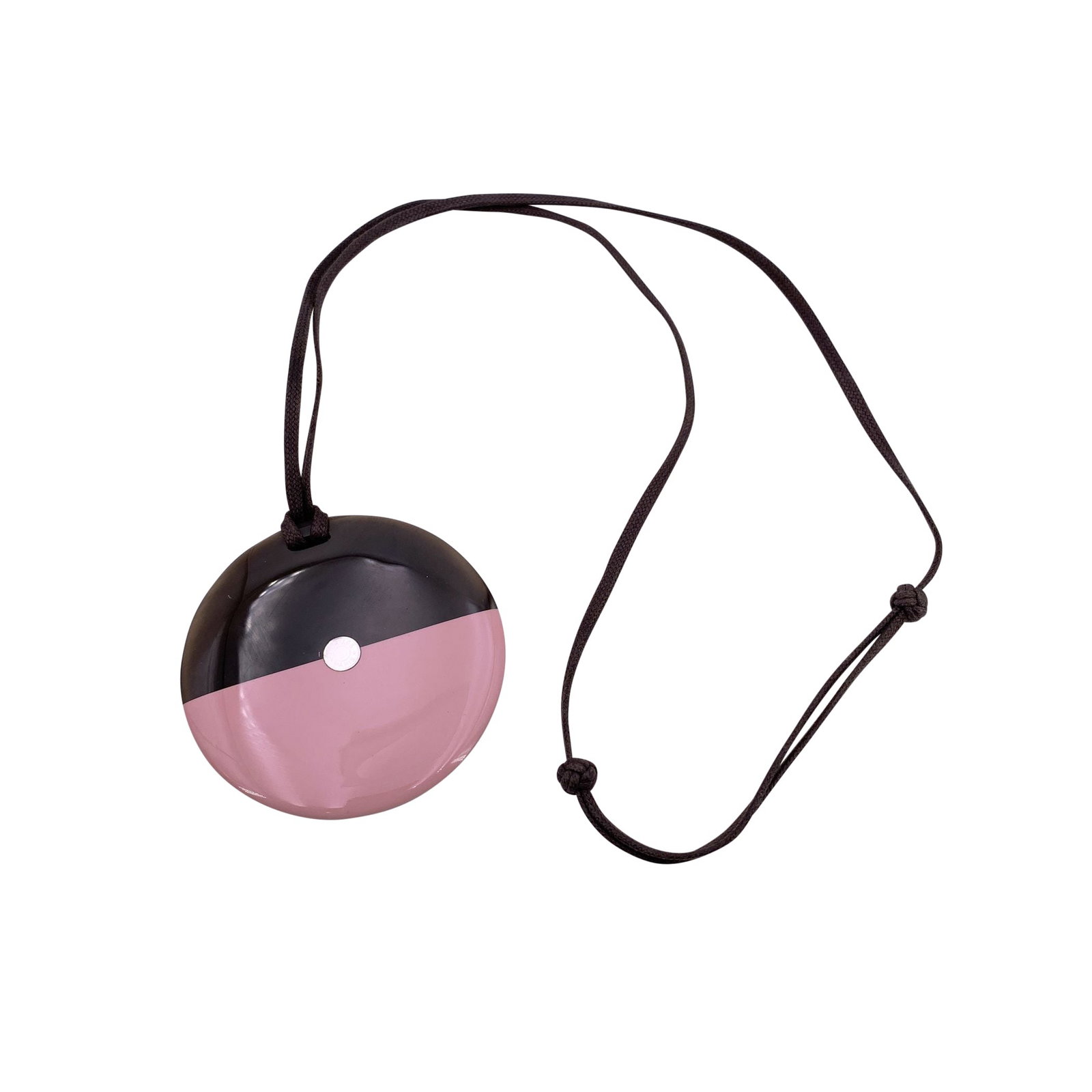 Hermes Horn Necklace: The Hermes Round Horn Necklace is a stunning example of natural elegance and contemporary craftsmanship. The pendant, crafted from lacquered buffalo horn, showcases a two-tone design in brown and soft
