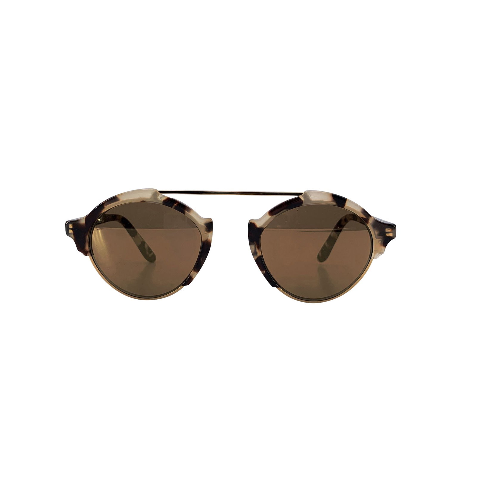 Illesteva Vintage Plastic Sunglasses: Step into the playful sophistication of 1980s Italian design with these Illesteva Round Unisex Sunglasses Milan 4 C08. Their round lenses are framed in a striking mix of transparent white and brown ac