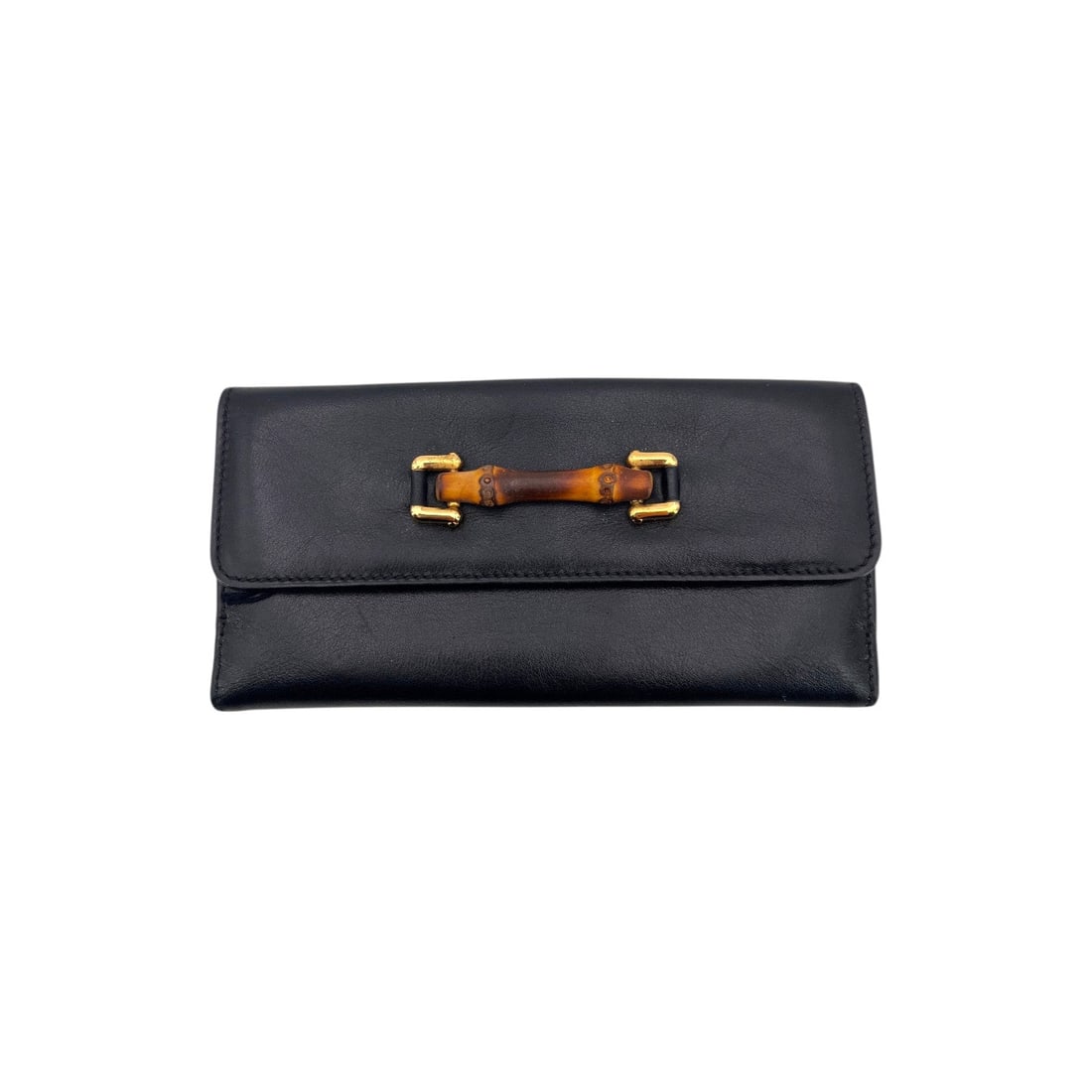 Gucci Vintage Leather Wallet: Step into the timeless elegance of the 1990s with this exquisite Gucci Vintage Bamboo Wallet. A true testament to Italian craftsmanship, this small women's accessory is meticulously crafted from premi