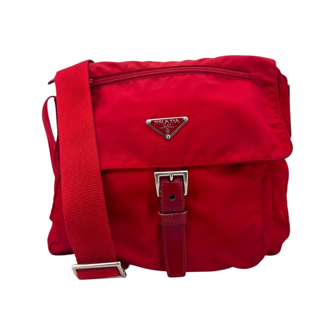 Prada Cloth Crossbody Bag Tessuto: Embrace the iconic aesthetic of the 2010s with this vibrant Prada Red Nylon Tessuto Medium Messenger Crossbody Bag. A standout piece for any vintage enthusiast, this bag is crafted from Prada's signat