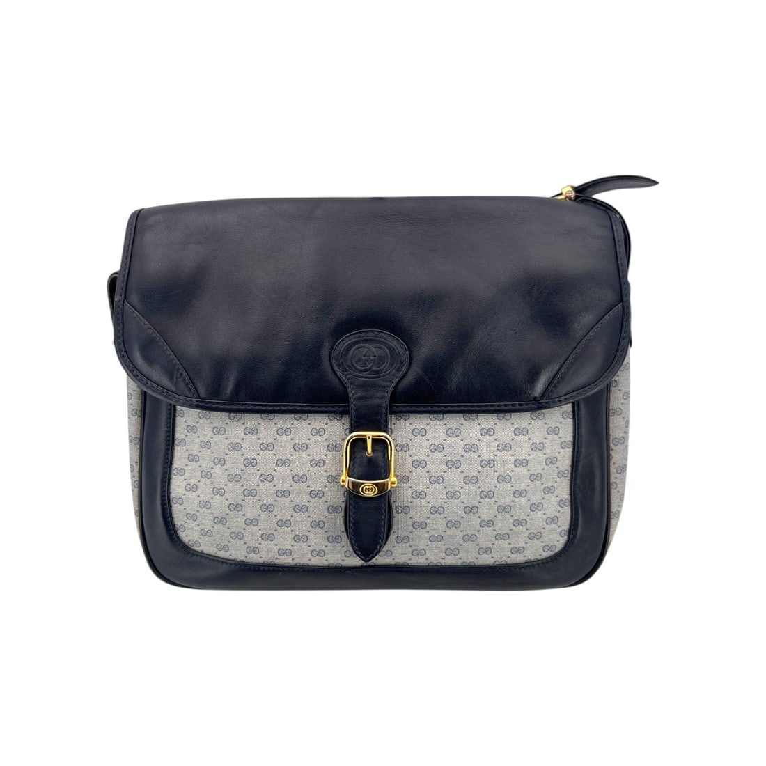 Gucci Vintage Cloth Crossbody Bag Micro GG Monogram: Transport yourself to the 1980s with this exquisite Gucci Vintage Blue Micro GG Monogram Messenger Shoulder Bag, a true testament to Italian craftsmanship. This medium-sized crossbody bag features the