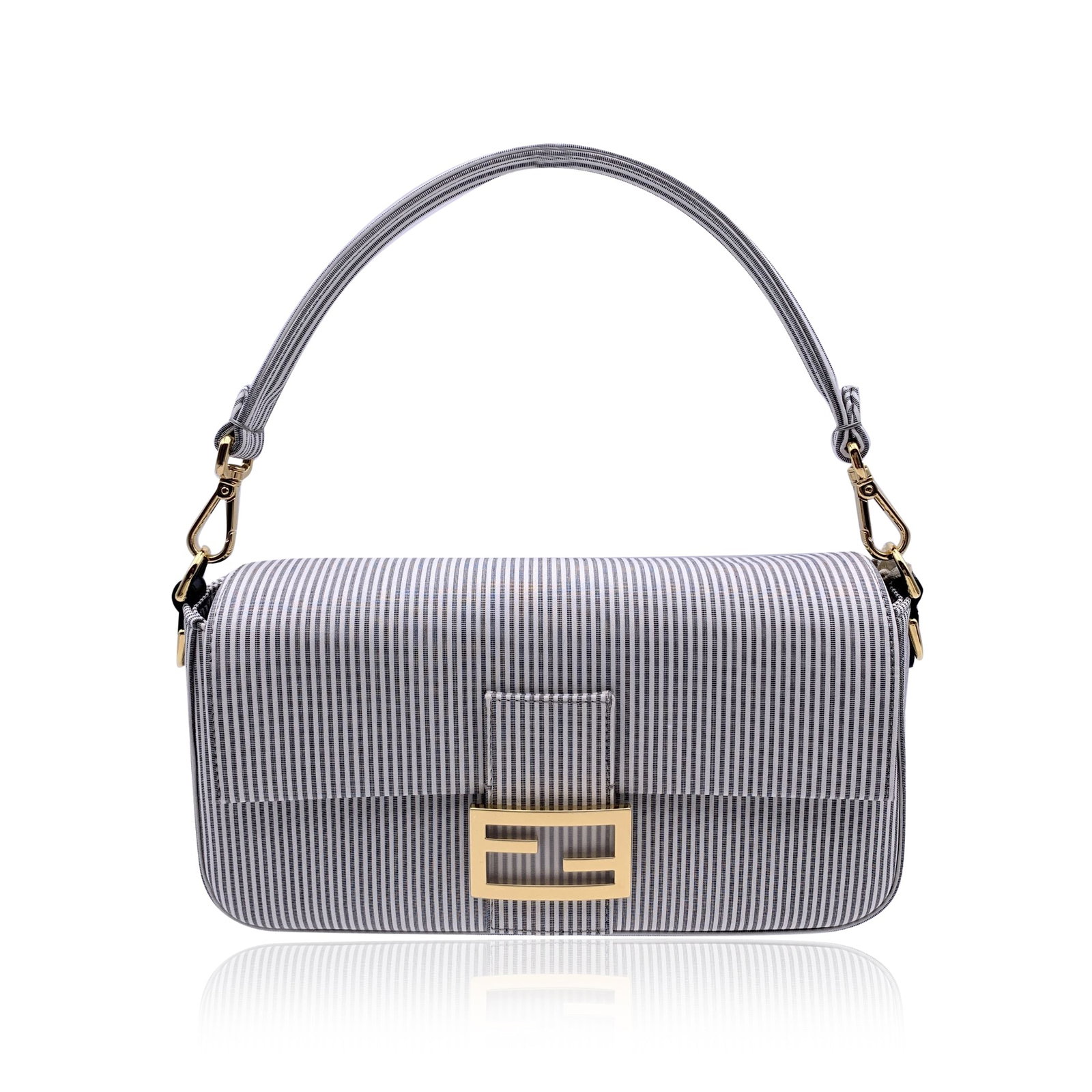 Fendi Cloth Shoulder Bag Baguette: Embrace the legacy of the most iconic it-bag with this contemporary Fendi Bretagna Baguette. Crafted in Italy in 2020 or later, this medium-sized treasure reimagines the classic silhouette in a sophis