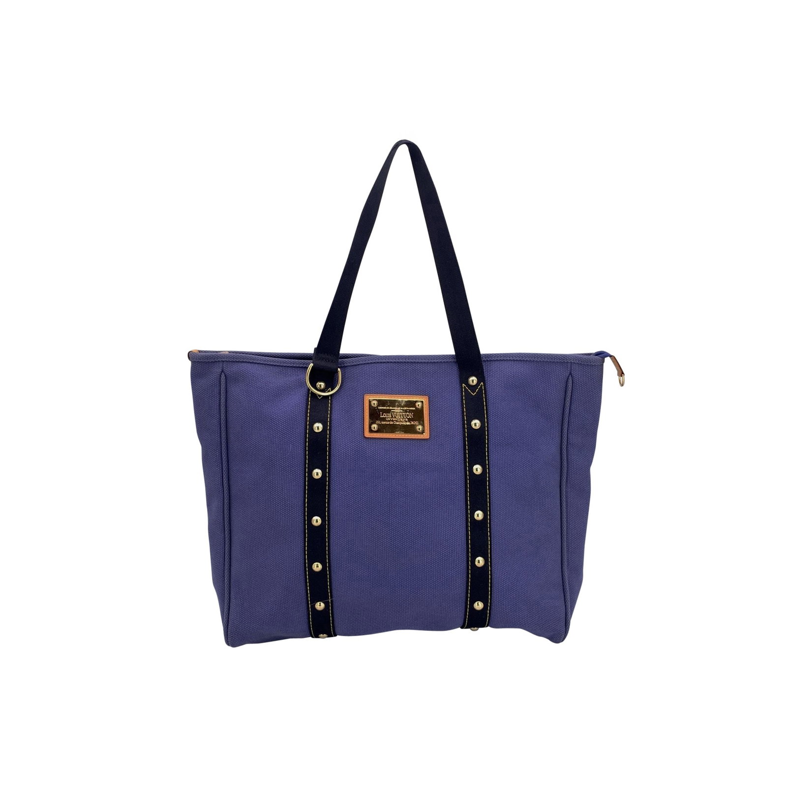 Louis Vuitton Cloth Tote Bag Antigua: Step into the relaxed elegance of the early 2000s with this Louis Vuitton Azul Blue Canvas Antigua GM Tote. As the first Louis Vuitton line crafted entirely from canvas, the Antigua model captures a n