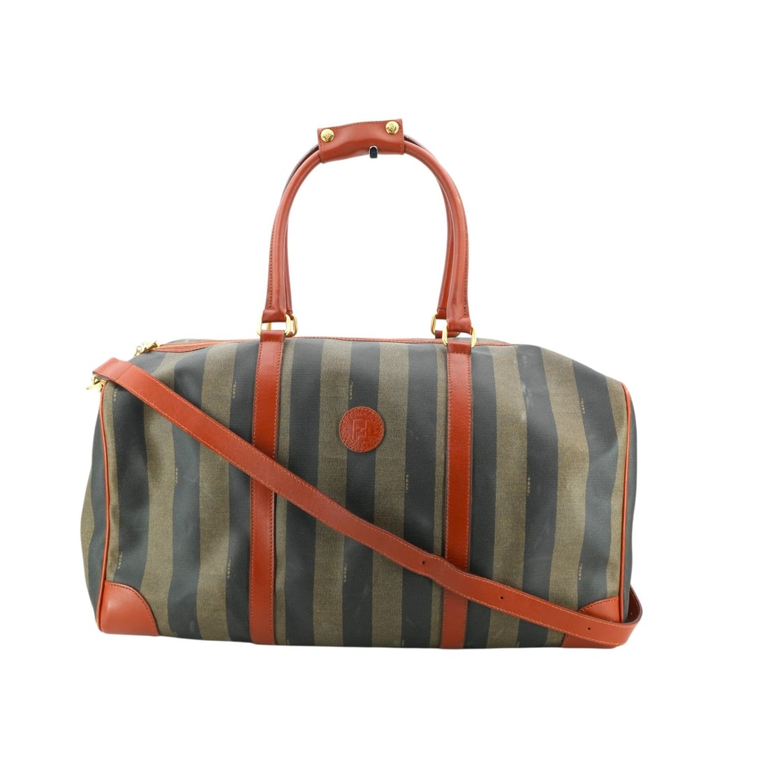 Fendi Vintage Cloth Luggage Pequin Travel Bag: Step into the golden age of Italian travel with this iconic Fendi Pequin canvas duffle bag. Dating back to the 1980s, this vintage treasure features the legendary brown striped pattern that has become