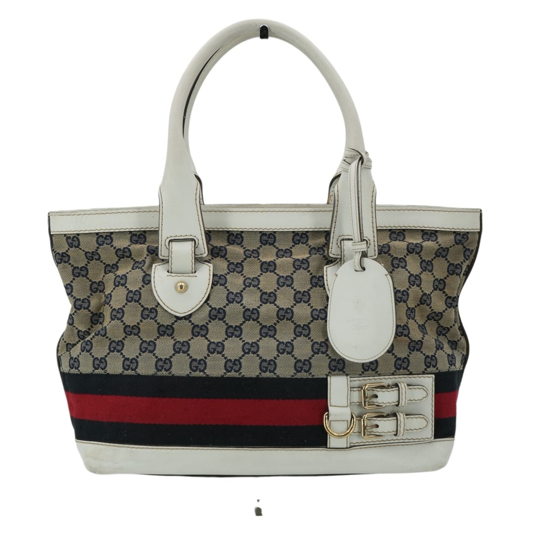 Gucci Cloth Tote Bag Heritage: Step into the world of timeless Italian luxury with the Gucci Heritage Tote, a piece that beautifully captures the brand's storied aesthetic. This medium-sized treasure, crafted in Italy between 2010 