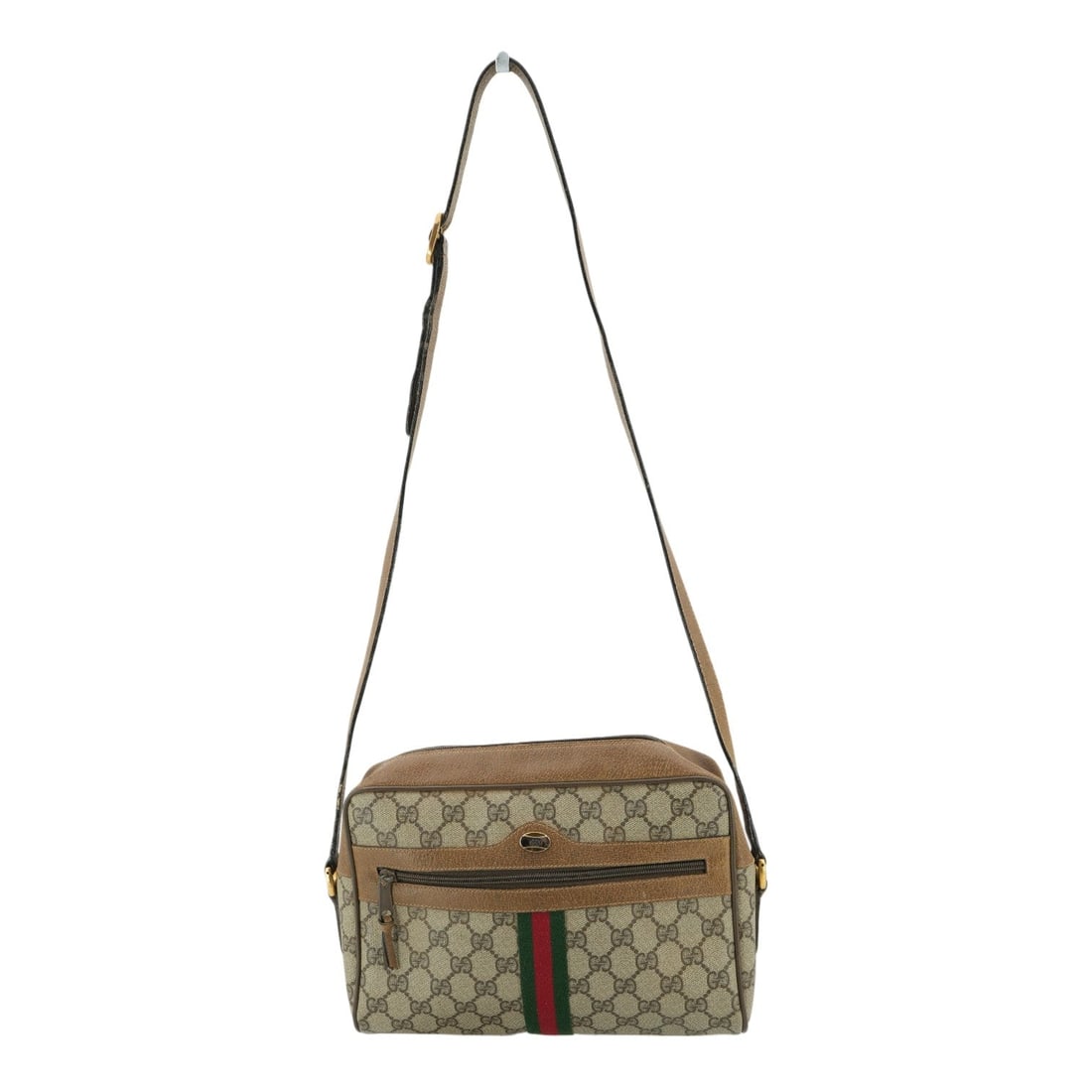 Gucci Vintage Cloth Crossbody Bag Ophidia: Discover the quintessential charm of Italian heritage with this Gucci Ophidia shoulder bag, a medium-sized masterpiece from the 1980s. This crossbody bag is meticulously crafted from signature brown m