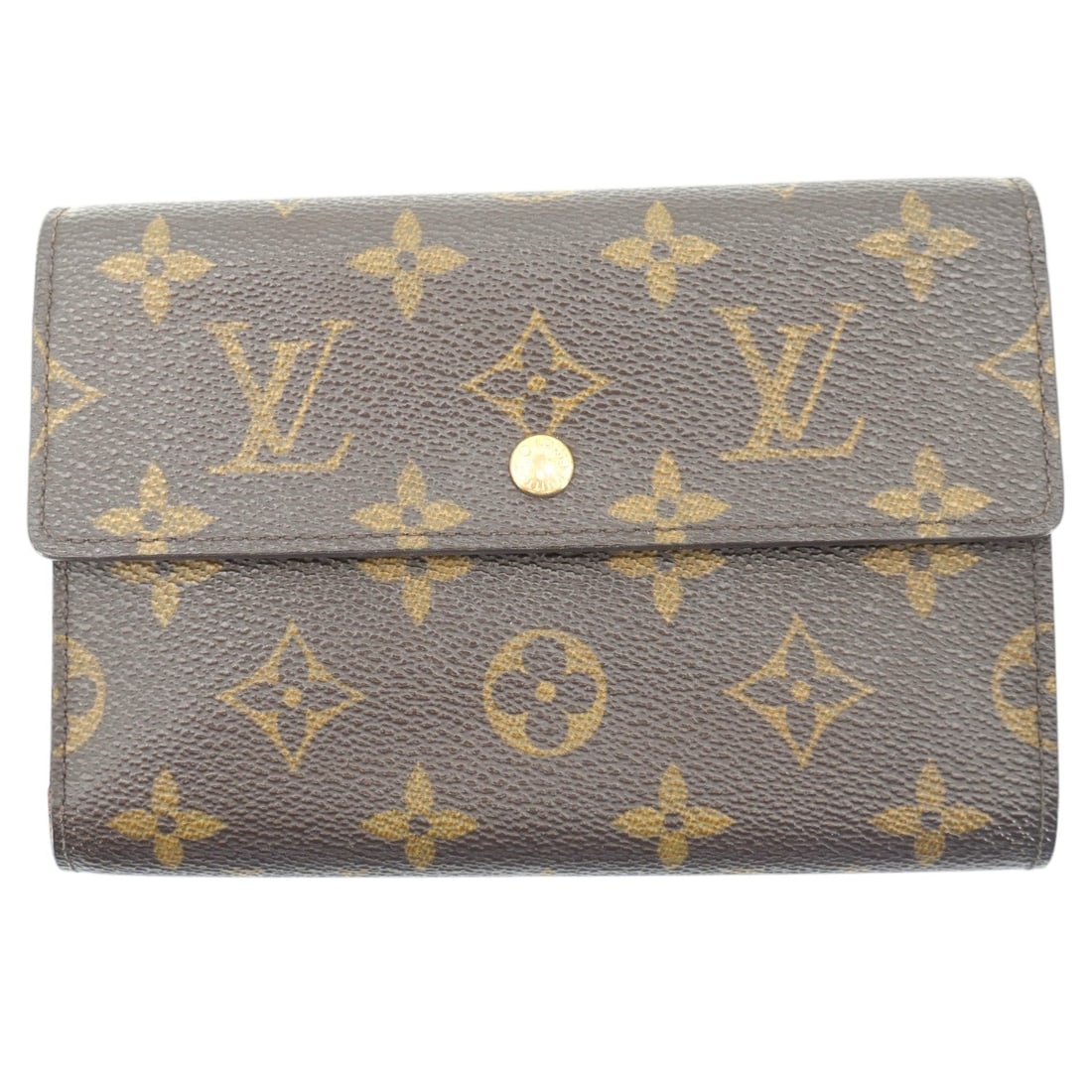 Louis Vuitton Cloth Wallet Porte Tresor: Embrace a piece of fashion history with the Louis Vuitton Porte Tresor Flap Wallet, a timeless treasure from the early 2000s. Expertly crafted in France between 2000 and 2009, this medium-sized access