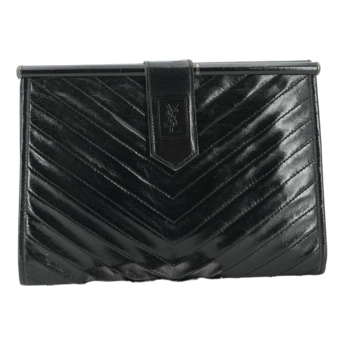 Yves Saint Laurent Leather Clutch Bag YSL: Embrace the essence of Parisian chic with this exquisite Yves Saint Laurent vintage clutch, a timeless treasure from the 2010-2019 era. Crafted in Italy, this small-sized gem is meticulously fashioned
