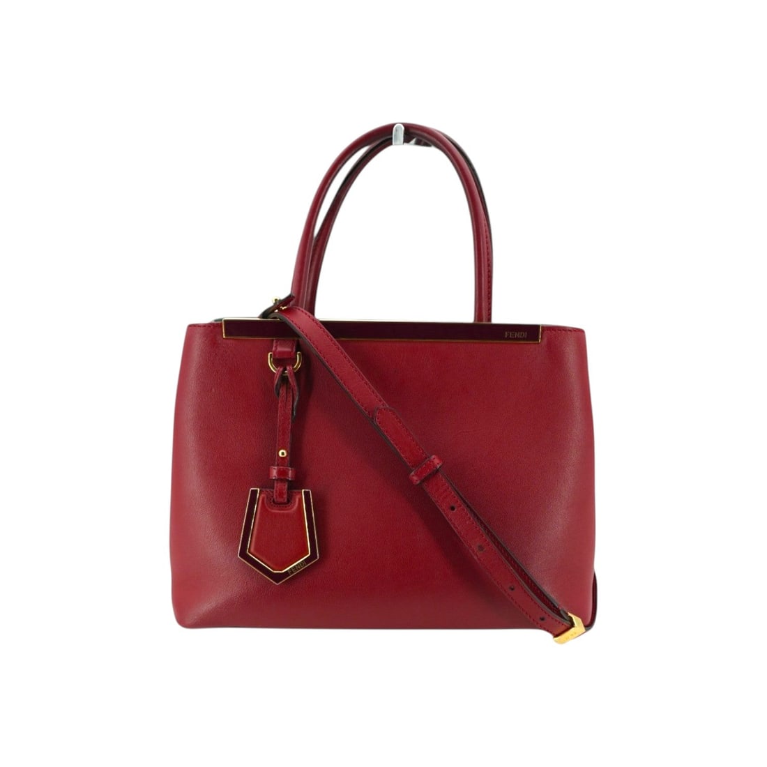 Fendi Leather Tote Bag 2Jours: Discover a modern classic with unmistakable Italian character: the Fendi Red Leather Petite 2Jours Tote Bag, a refined companion that blends structure, elegance, and everyday practicality. Created by 
