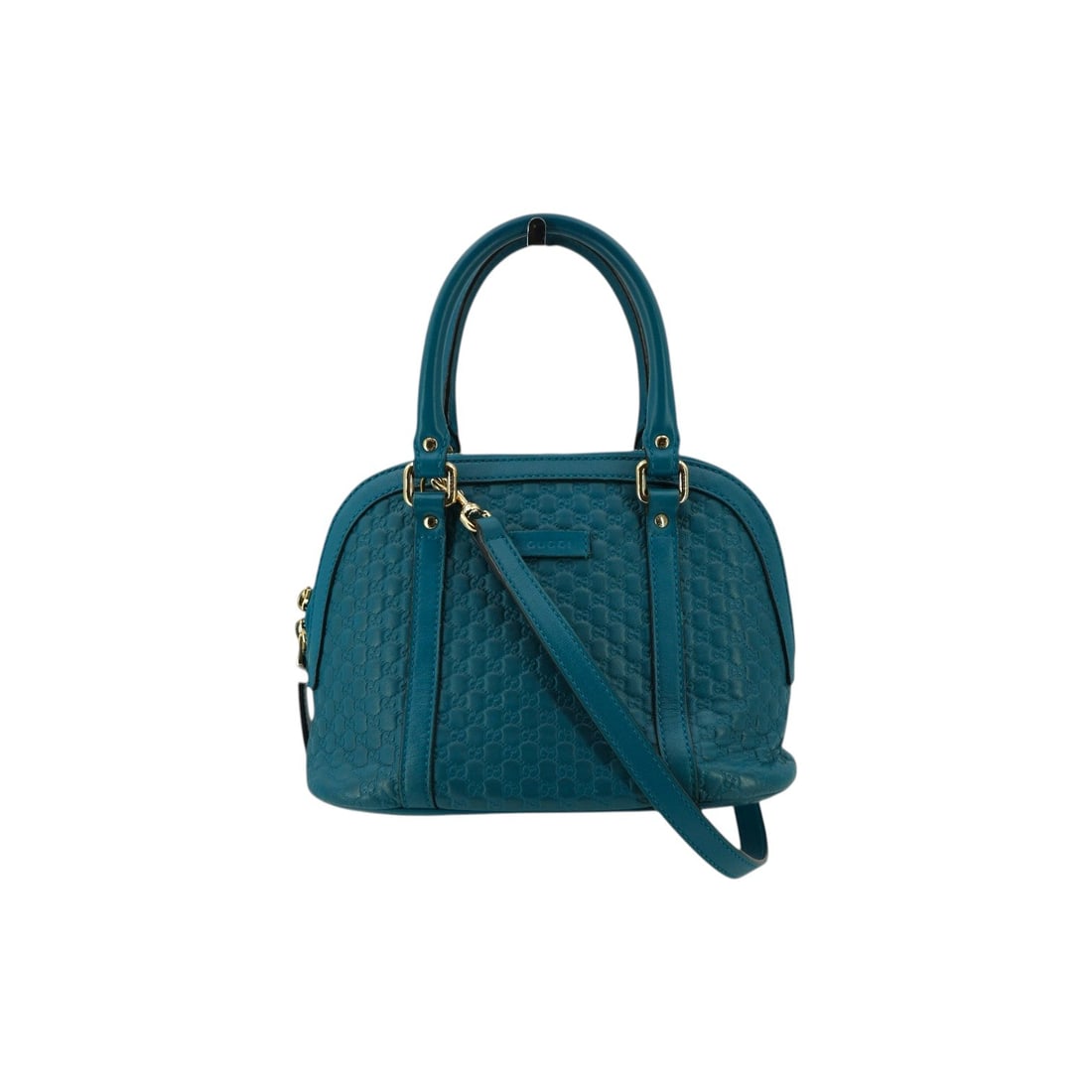 Gucci Leather Handbag Dome: Step into a world of playful sophistication with the Gucci Turquoise Microguccissima Leather Small Nice Dome Bag, a standout piece from GUCCI?s iconic lineup. Crafted in Italy between 2010 and 2019, t