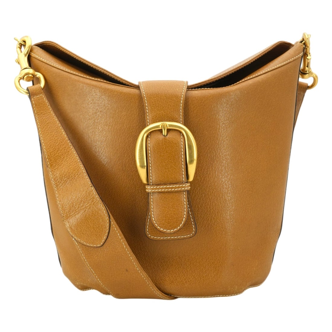 Gucci Vintage Leather Shoulder Bag Buckle Bucket: A refined example of 1990s Gucci design, this vintage beige bucket shoulder bag reflects the understated elegance that defined the era. Crafted in tan leather with a clean, minimalist silhouette, the 