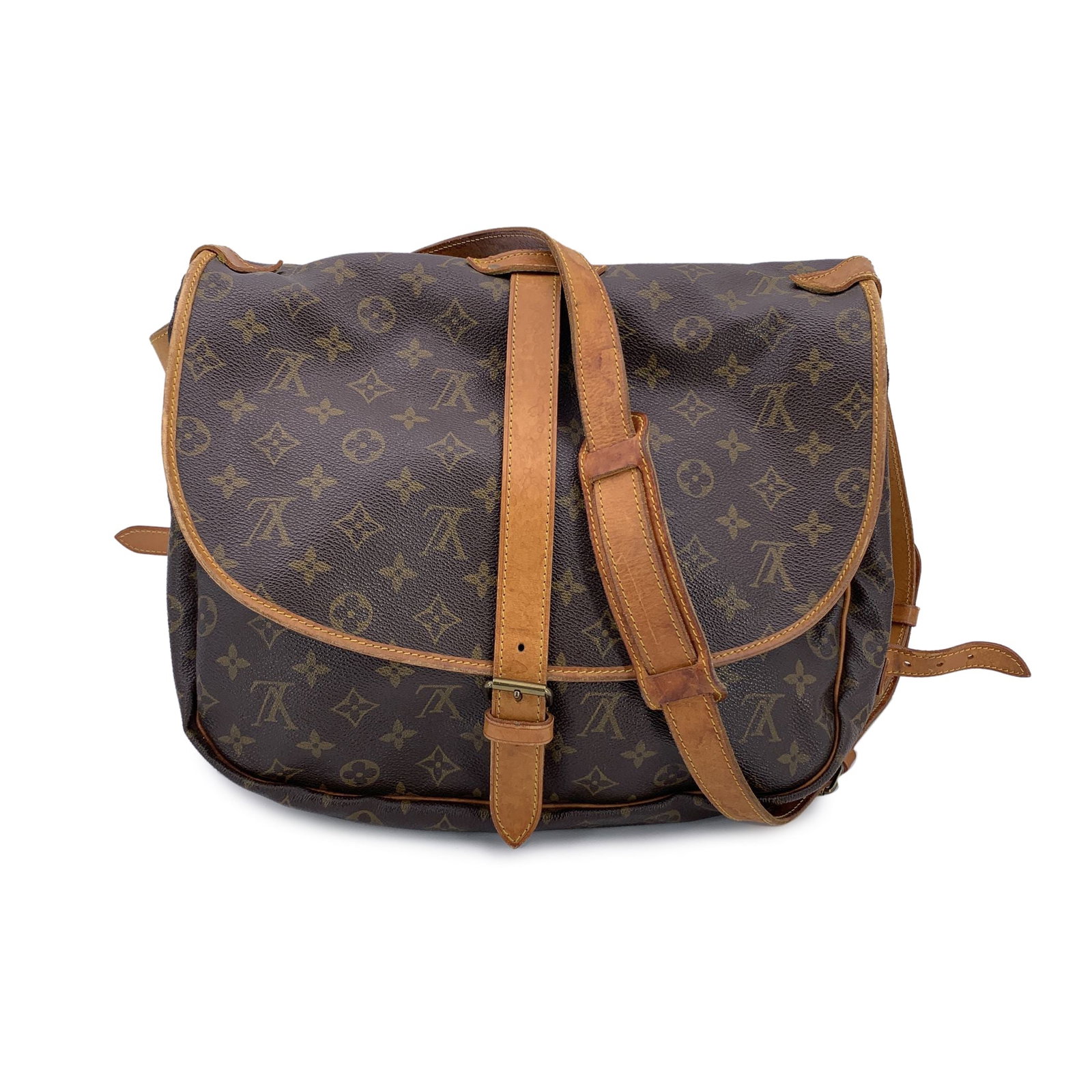 Louis Vuitton Vintage Cloth Crossbody Bag Saumur: Step into a world of classic Louis Vuitton style with the iconic 'Saumur 35' bag, a true tribute to equestrian design and craftsmanship. Inspired by the saddle bags traditionally used by riders, the S
