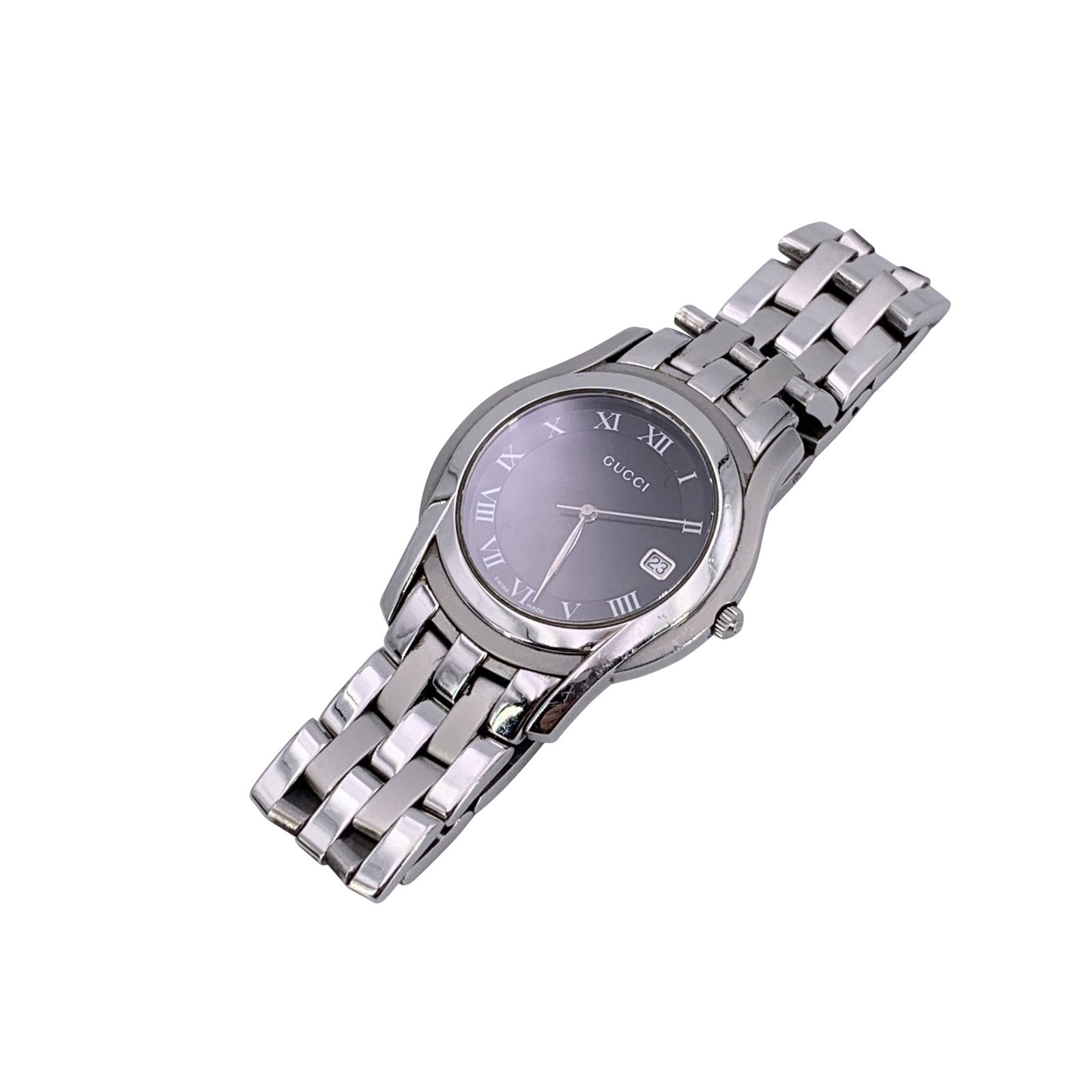 Gucci Steel Watch GTimeless: Gucci silver tone stainless steel wrist watch, mod. 5500 M. Black Dial. Date at 3 o' clock. Sapphire crystal. Swiss Made Quartz movement. Gucci written on face. Roman numbers. Gucci crest on the rever