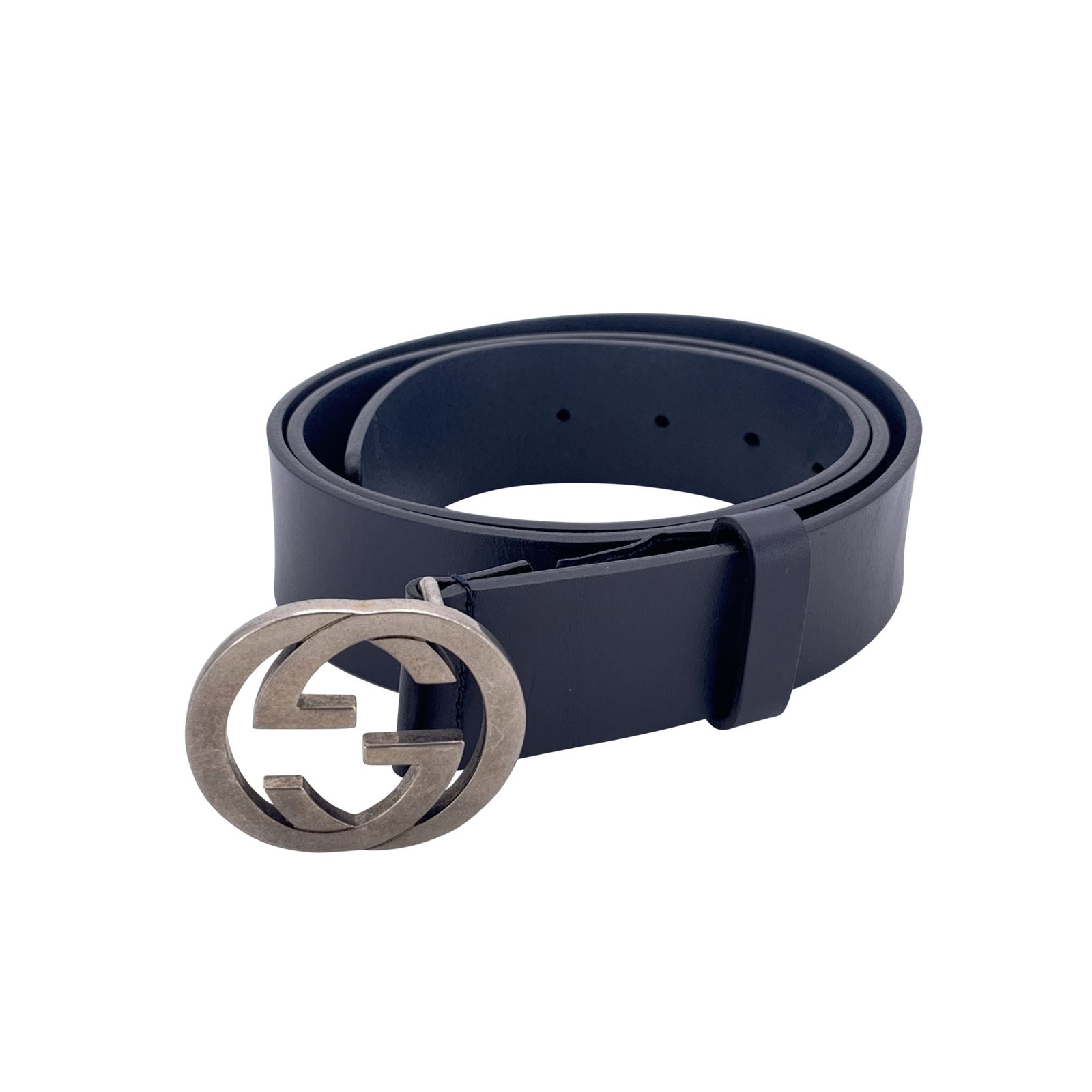 Gucci Leather Belt GG Buckle: There's a certain elegance that only a true vintage belt can carry-one that has been worn, loved, and still holds its shine. This Gucci black leather belt is a perfect example. Made in Italy between 2