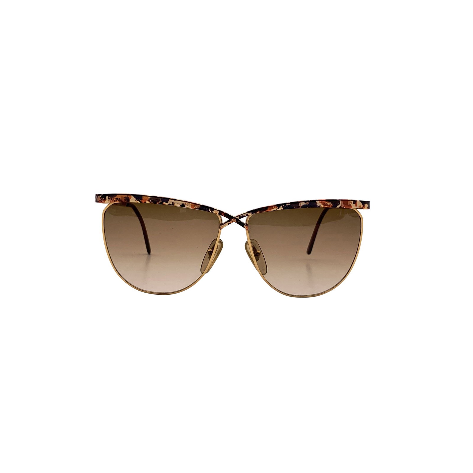 Laura Biagiotti Vintage Metal Sunglasses: A refined whisper of 1980s elegance, these Laura Biagiotti vintage cat-eye sunglasses embody the quiet glamour of a decade that loved strong silhouettes softened by grace. Made in Italy during the 198