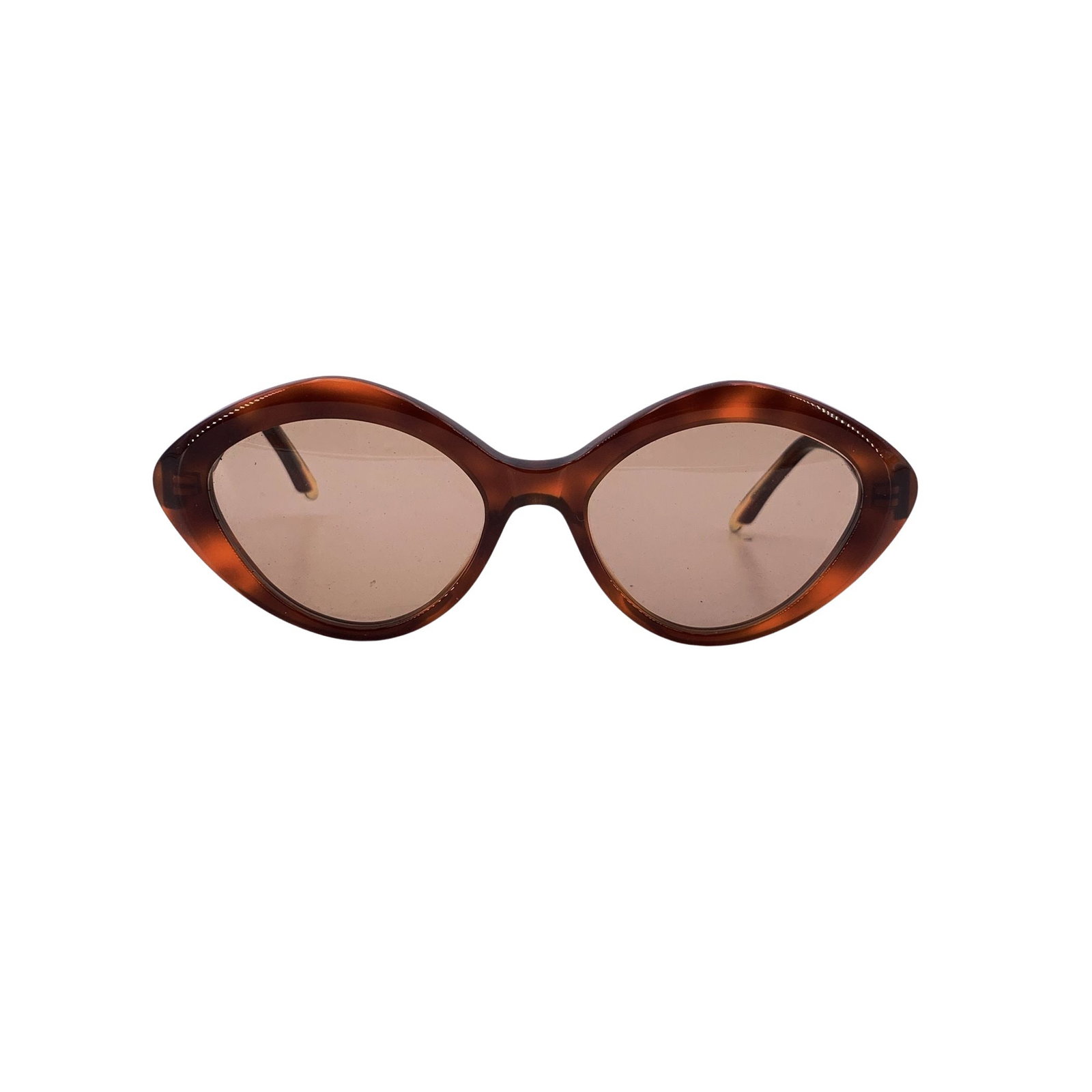 Other Brand Vintage Plastic Sunglasses: A warm and understated piece of Italian vintage eyewear, these oval sunglasses by Silvan Heach echo the effortless elegance that defined the late 1980s. Made in Italy between 1980 and 1989, they refle