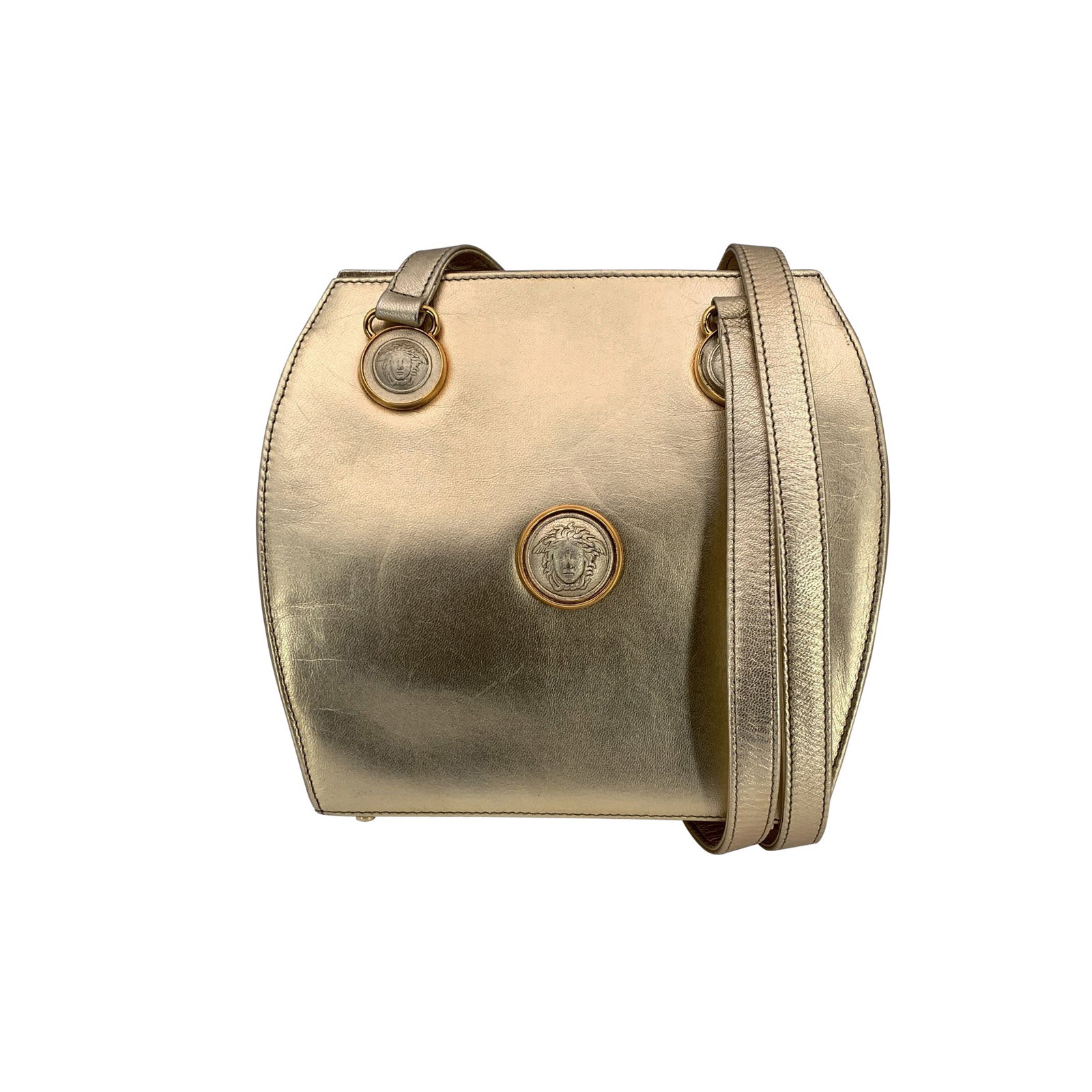 Gianni Versace Leather Crossbody Bag: A true Gianni Versace gem, this Gianni Versace Gold Leather Long Double Straps Shoulder Bag feels like a snapshot of Italian glamour at its most confident. Made in Italy between 1990 and the 1999, it 