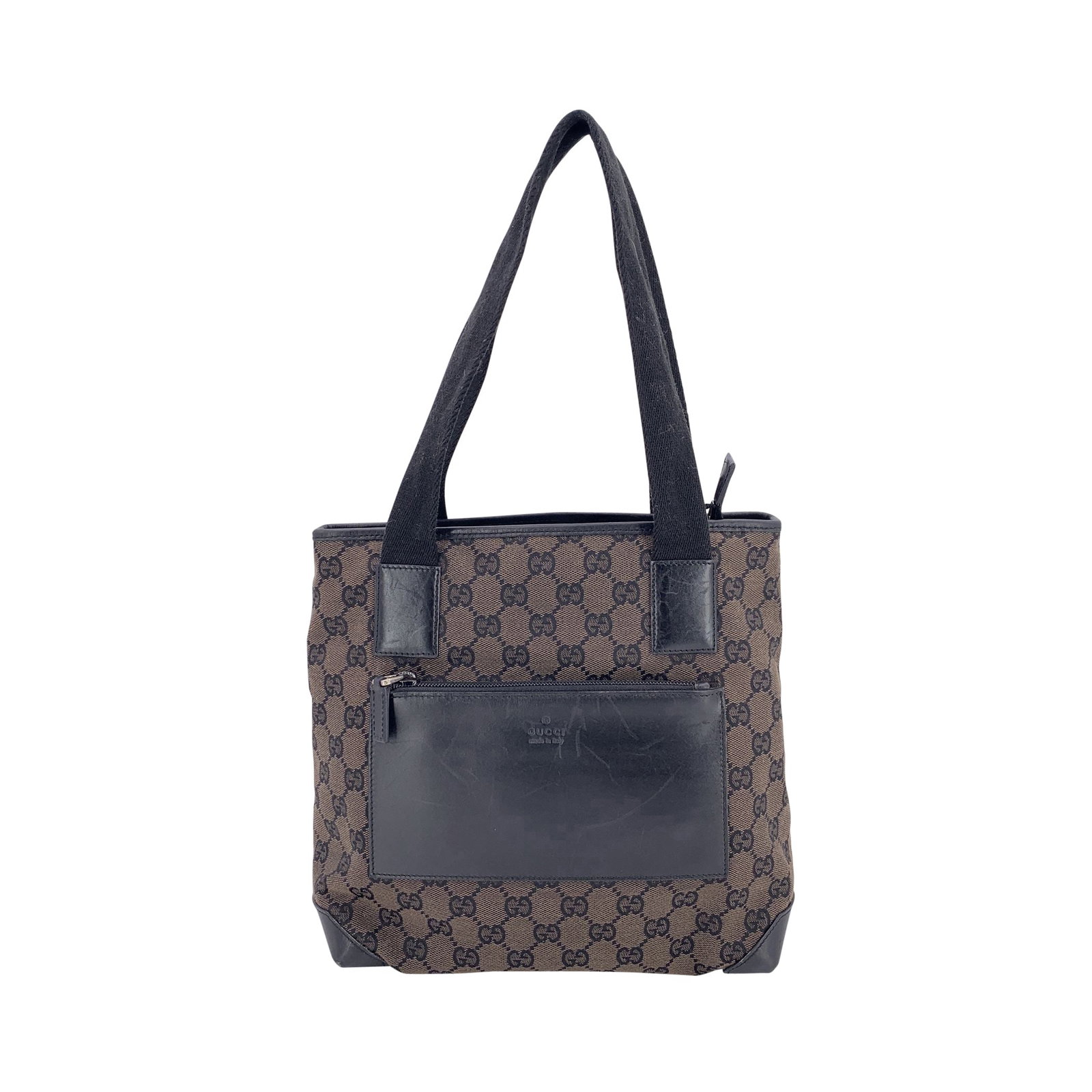 Gucci Cloth Shoulder Bag: This Gucci vintage tote captures the early 2000s spirit with a clean, structured silhouette and the House's unmistakable monogram charm. Crafted in Italy from durable brown monogram canvas, it showcas