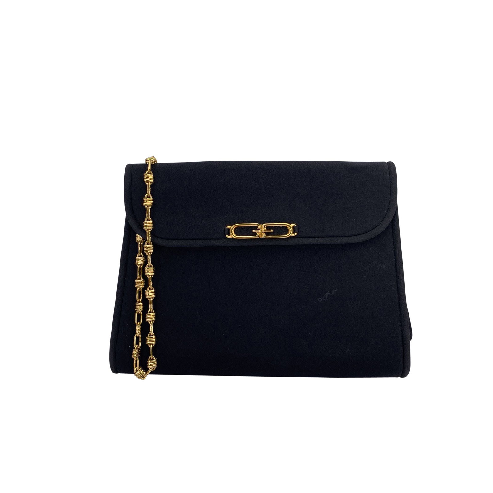 Gucci Vintage Cloth Shoulder Bag: This Gucci vintage evening shoulder bag is a captivating piece from the 1980s, a decade where glamour met refined Italian craftsmanship. Crafted in Italy from smooth black satin, the bag's sleek, mini