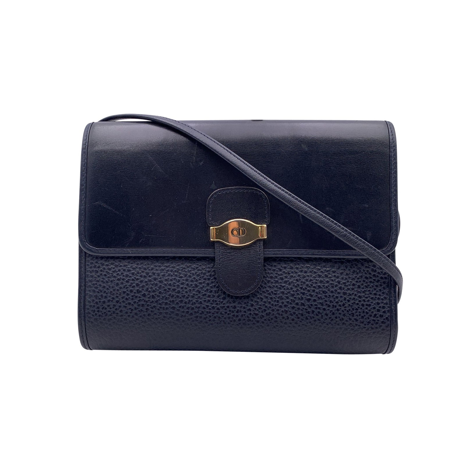 Dior Vintage Leather Crossbody Bag: A refined statement from Christian Dior's 1980s archives, this vintage blue leather shoulder bag reflects the house's timeless approach to elegance and detail. Crafted in France, it embodies a decade 