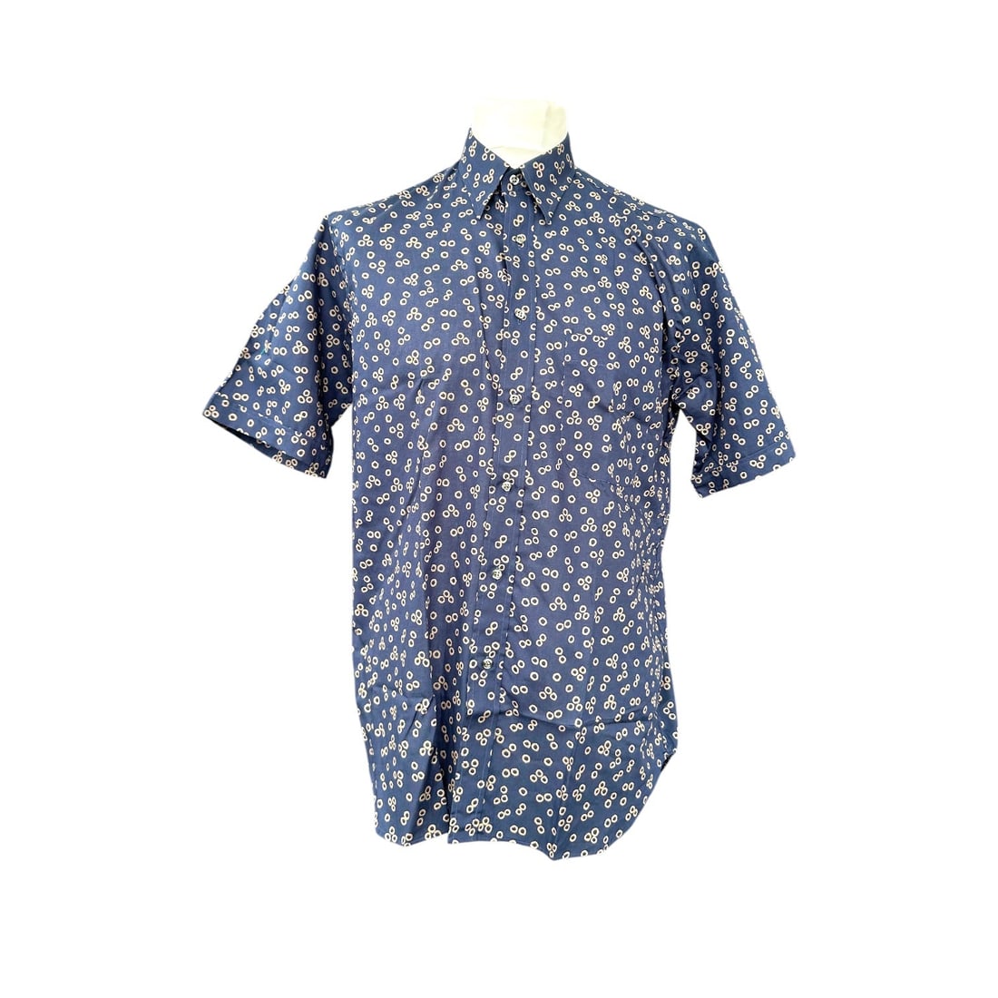 Ingram Vintage Cotton Shirt Unisex Shirt: Step back into the 1990s with this exceptional Ingram navy blue with gray small circles pattern cotton shirt, a true find for any vintage enthusiast. Expertly crafted in Italy, this short-sleeve piece