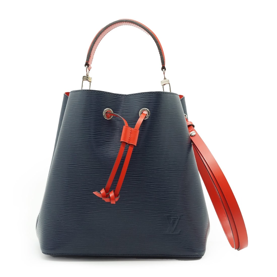 Louis Vuitton Leather Shoulder Bag NeoNoe: Step into the legacy of Louis Vuitton with the NeoNoe, a modern reimagining of the iconic 1932 champagne carrier. This medium-sized bucket bag, crafted in France between 2010 and 2019, showcases the t