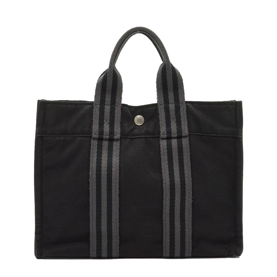 Hermes Vintage Cloth Handbag Fourre-Tout: Transport yourself to the 1990s with this classic Hermes Fourre-Tout, a model that redefined casual luxury with its practical yet sophisticated design. This small-sized tote, expertly crafted in Franc