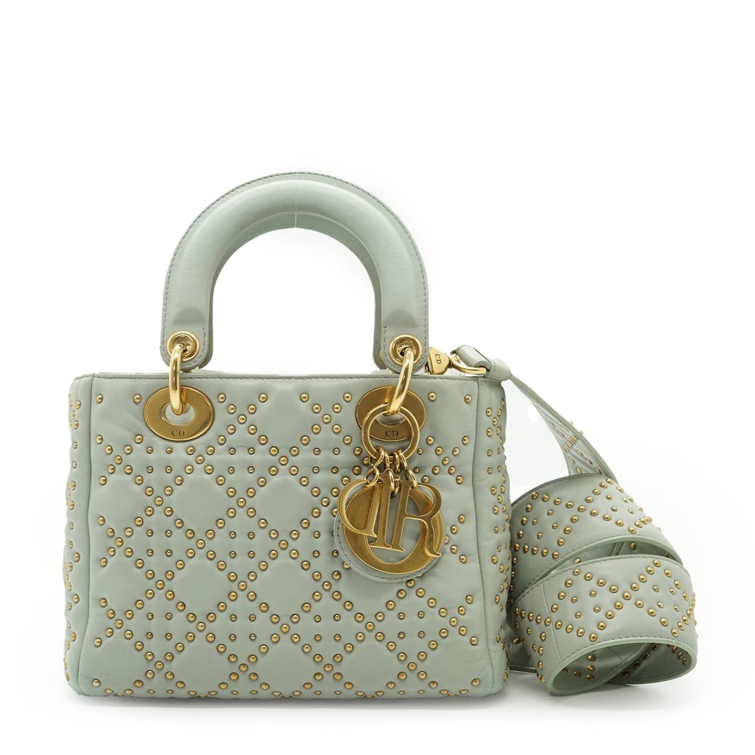 Dior Cloth Handbag Lady Dior: Step into the world of Parisian luxury with this Christian Dior Light Blue Cannage Studded Leather Mini Lady Dior Bag. A masterpiece of French craftsmanship from the 2010-2019 era, this small handbag 