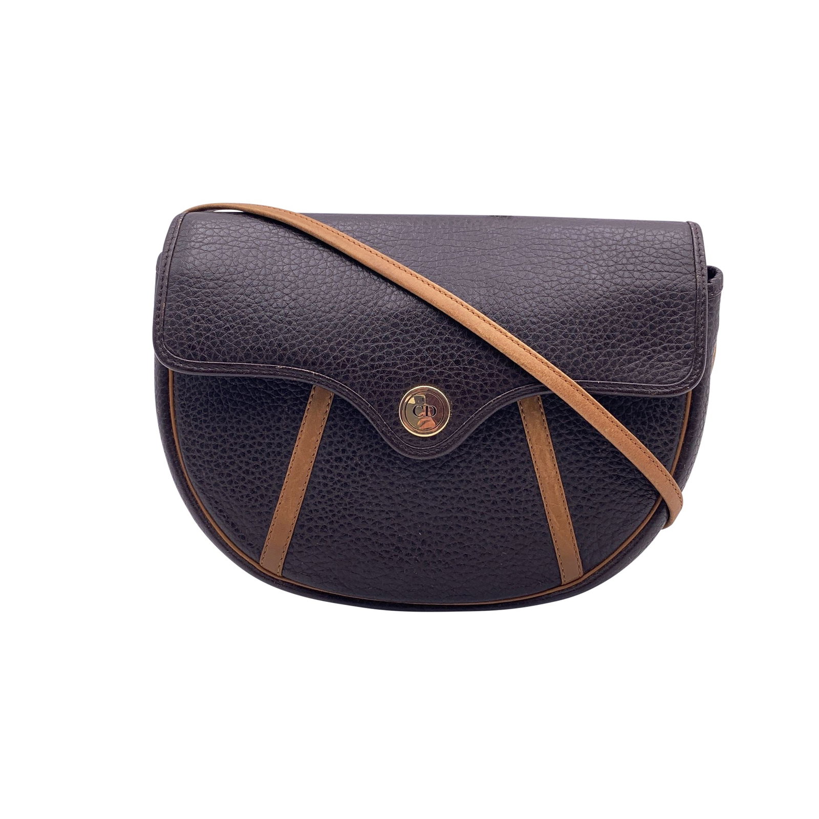 Dior Vintage Leather Crossbody Bag CD: Embrace the timeless allure of the 1980s with this exquisite Christian Dior crossbody bag, a masterpiece of Italian craftsmanship. This small shoulder bag is crafted from rich brown leather, offering 