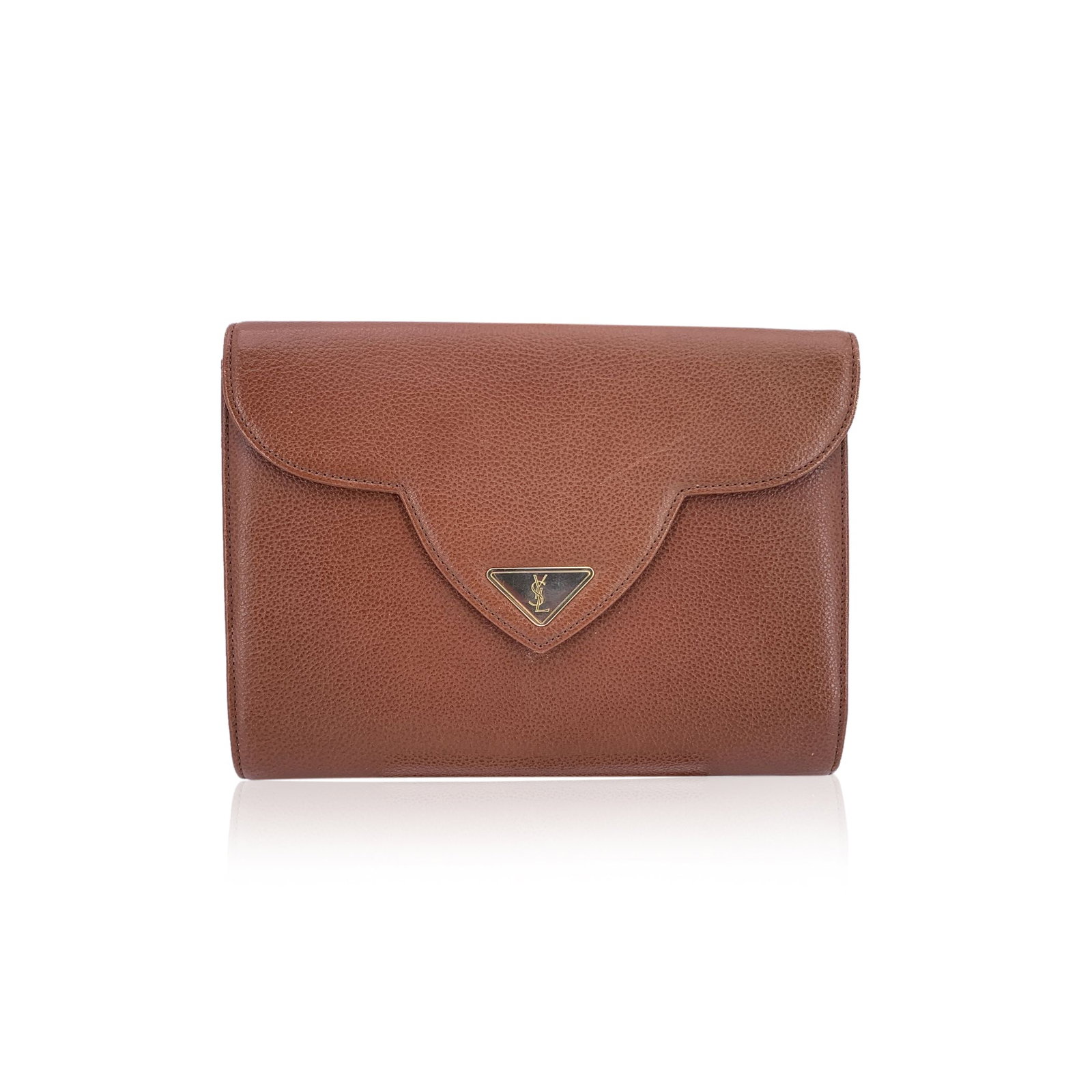 Yves Saint Laurent Vintage Leather Clutch Bag YSL: Step back into the 1980s with this exquisite Yves Saint Laurent clutch, a piece of French history crafted from luxurious brown leather. This small handbag showcases a minimalist plain design and a sop