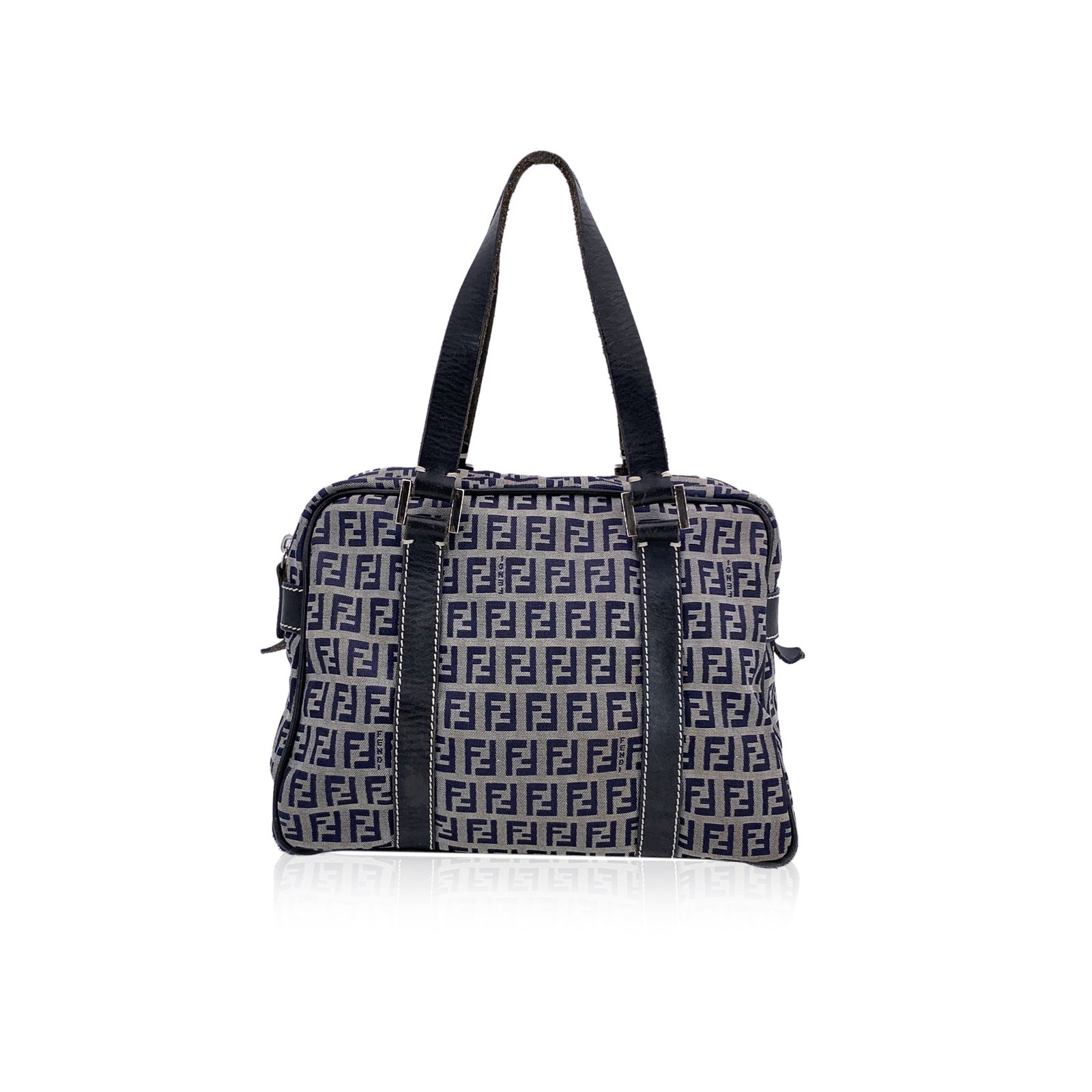 Fendi Cloth Handbag Zucchino: Travel back to the early 2000s with this elegant Fendi Zucchino Canvas Satchel, a beautifully crafted piece from Italy. This medium-sized handbag showcases the distinctive grey and blue monogram patte